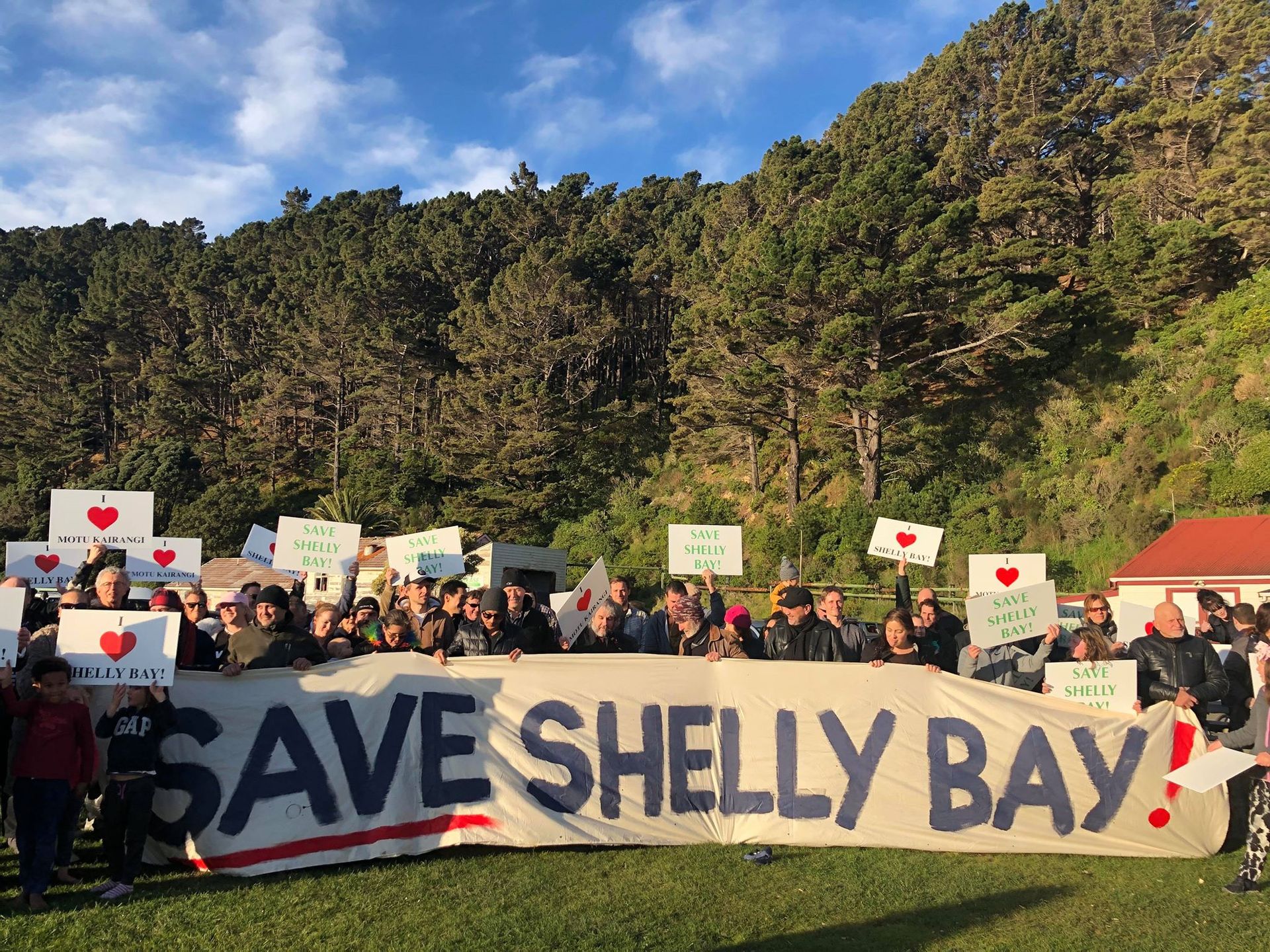 Supporters for Andy Foster gather at his announcement in Shelly Bay this afternoon. Photo / Georgina Campbell