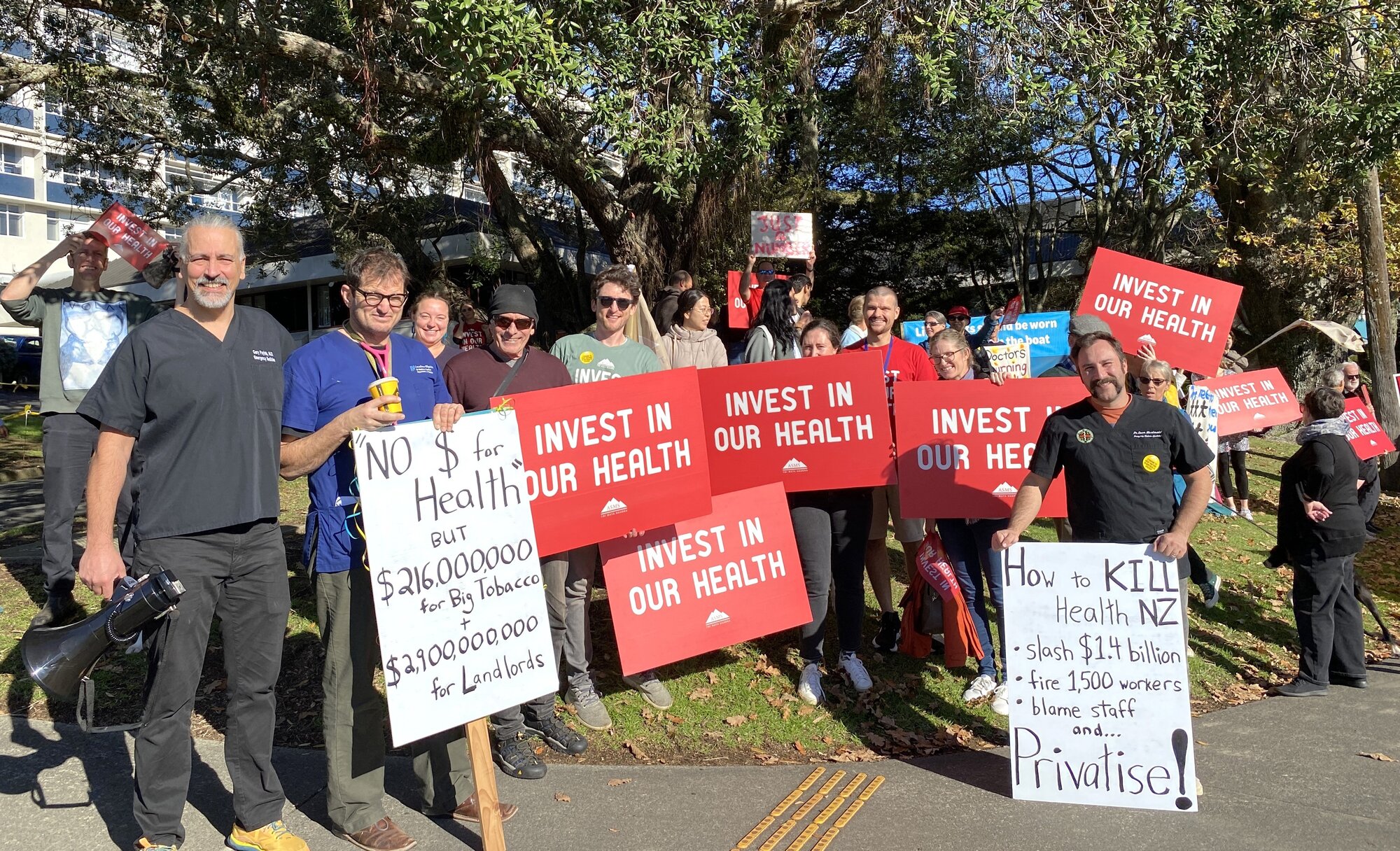 About 240 senior doctors and dentists from Northland hospitals went on strike on Wednesday, including Dr Gary Payinda (left front, in black) and Dr Eugene Fayerberg (centre front, in green). Photo / Denise Piper