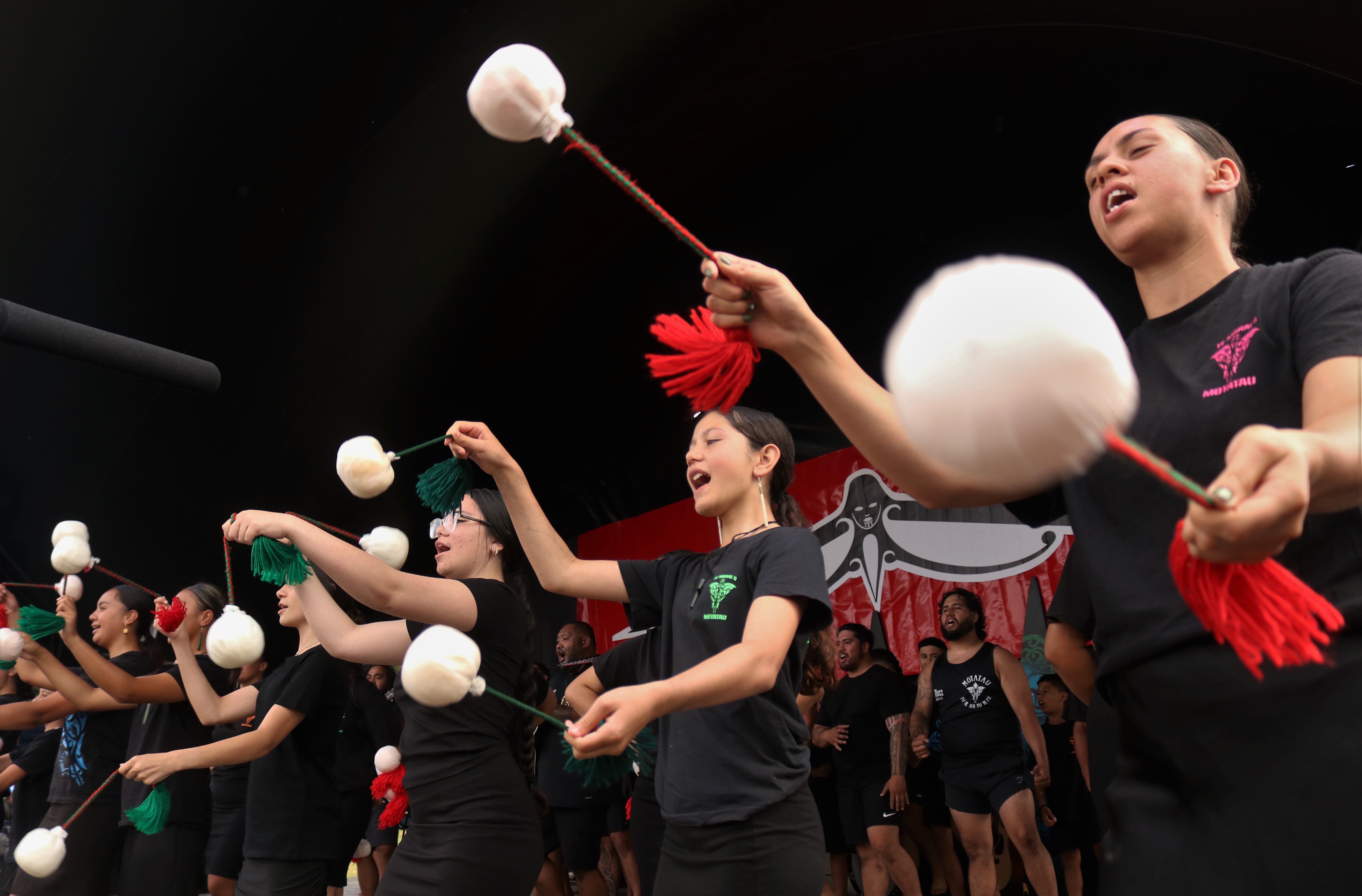 The wāhine of Motatau Marae perform a poi song. Photo / Peter de Graaf