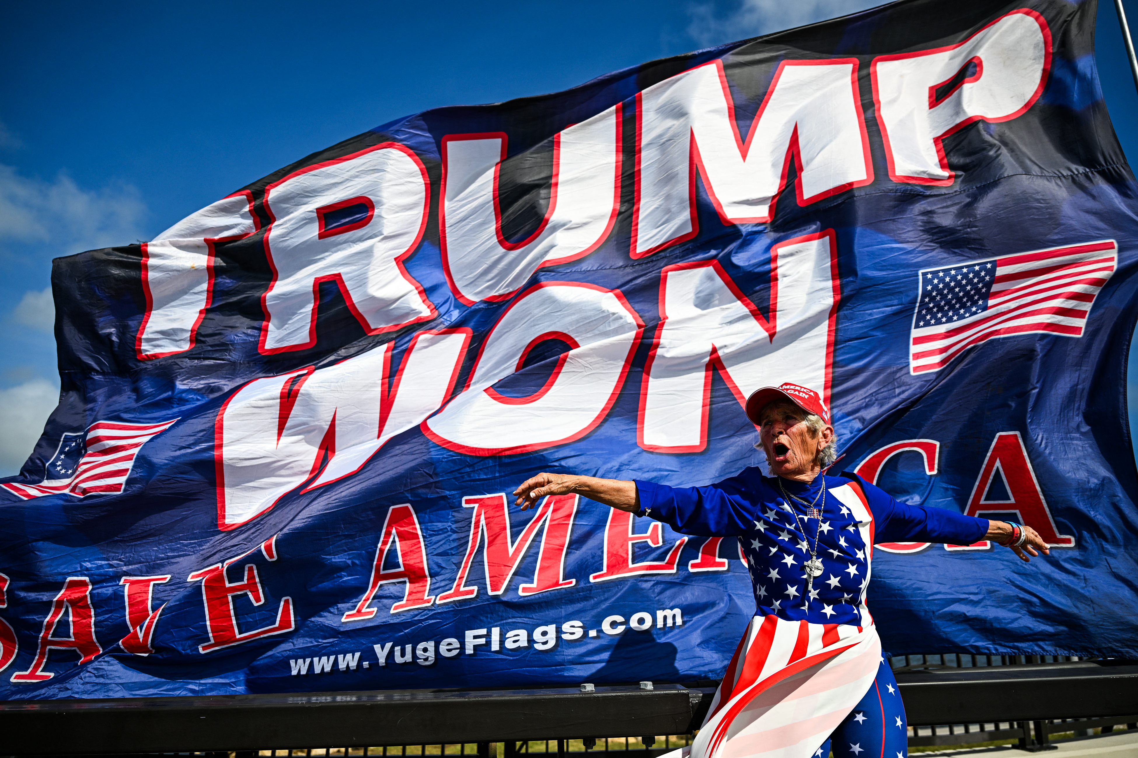 Trump supporters celebrate his victory near his Mar-a-Lago resort in Palm Beach, Florida. Photo / Chandan Khanna, AFP