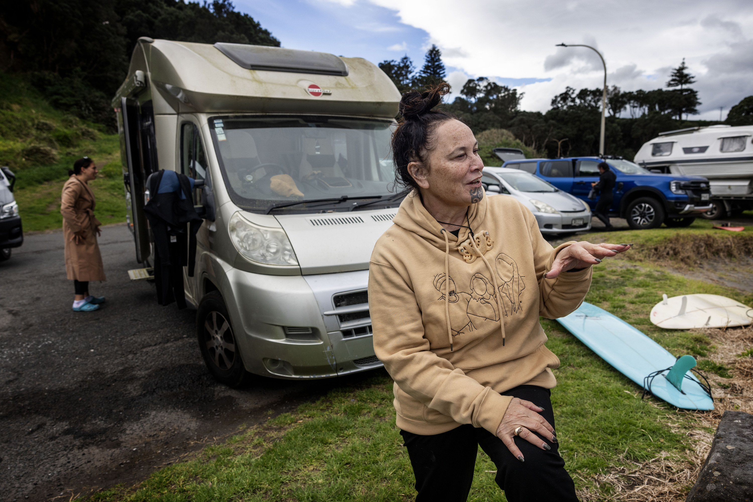 Debbie Ngarewa-Packer had some hesitation about going for a surf due to the cold temperatures, but her love of the sport overcame it. Photo / Mike Scott