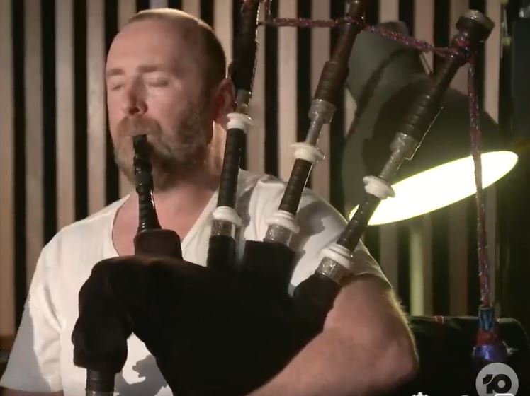 Bagpipes were played during Jimmy Barnes' emotional tribute song to the late MasterChef judge, Jock Zonfrillo. Photo / The Project