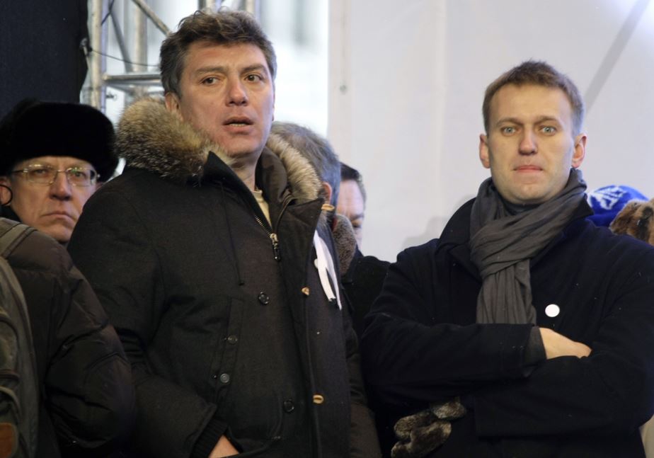 Former Finance Minister Alexei Kudrin (left) and opposition leaders Boris Nemtsov and Alexei Navalny at a rally to protest alleged vote rigging in Russia's parliamentary elections. Photo / AP