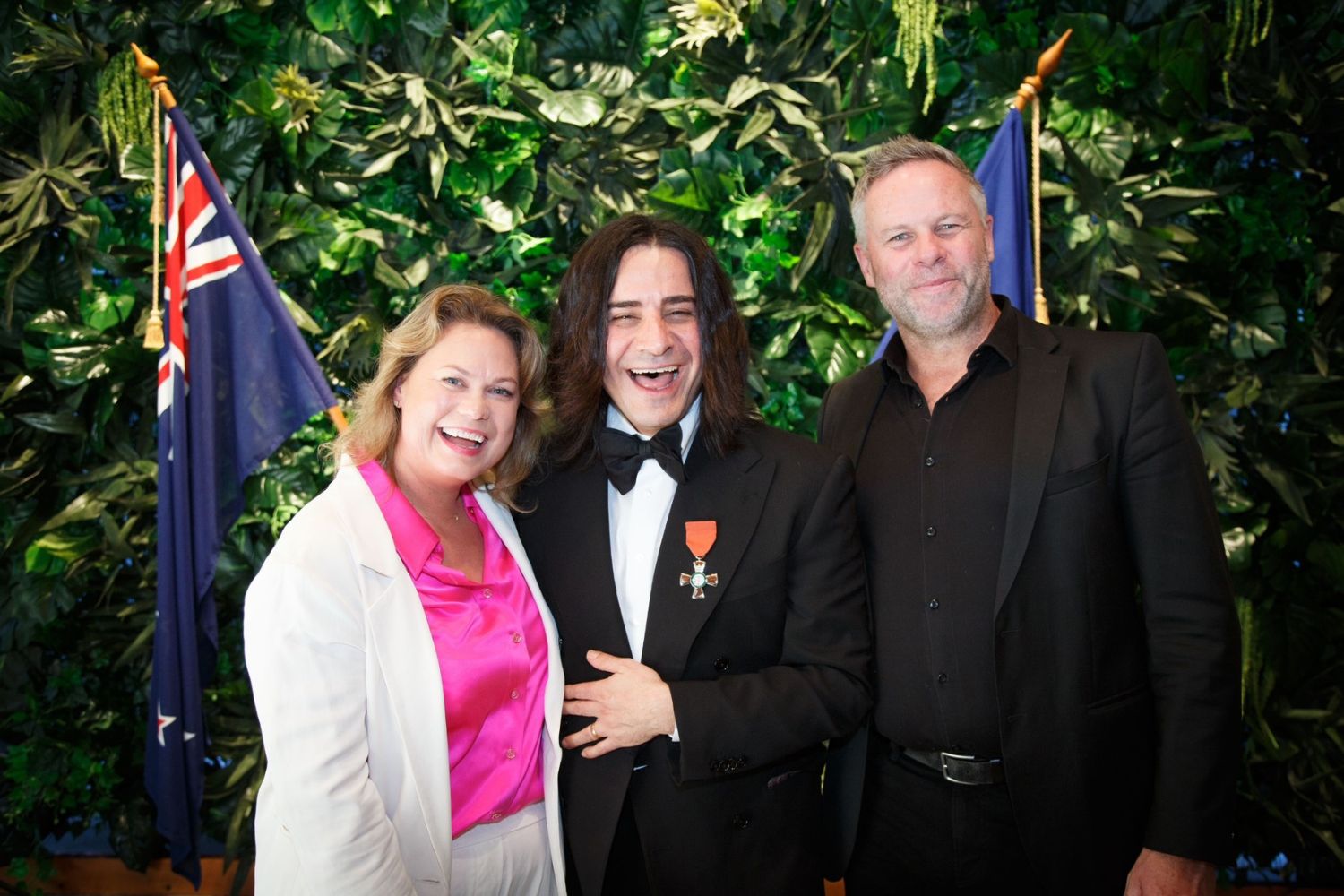 Danny (centre) invited a handful of friends to attend the Investiture Ceremony, including footwear designer Kathryn Wilson (left) and brand strategist Liam Taylor (right). Photo / Supplied