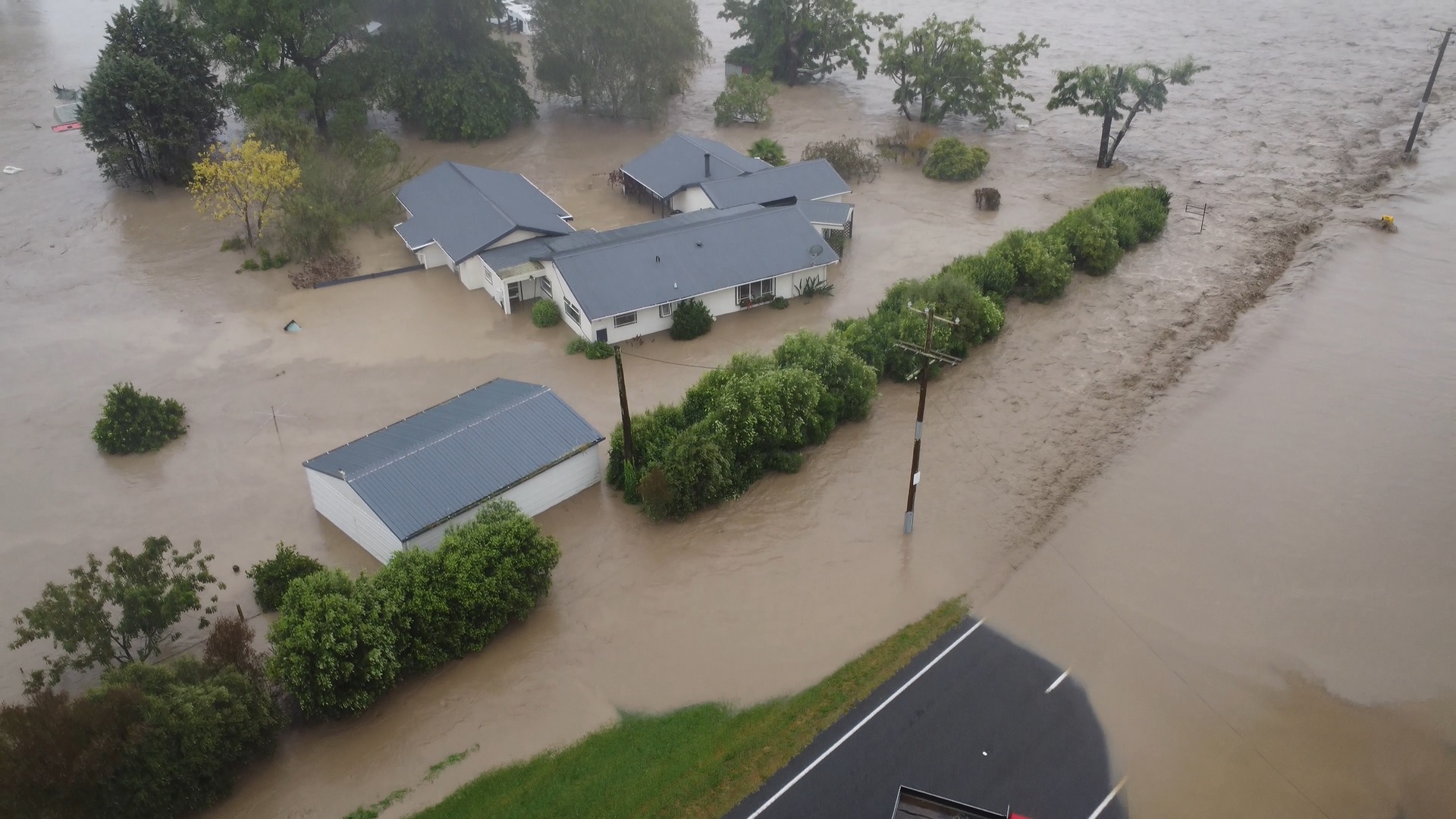 A house flooded on Swamp Rd on Tuesday morning. Photo / Matt Wheatley