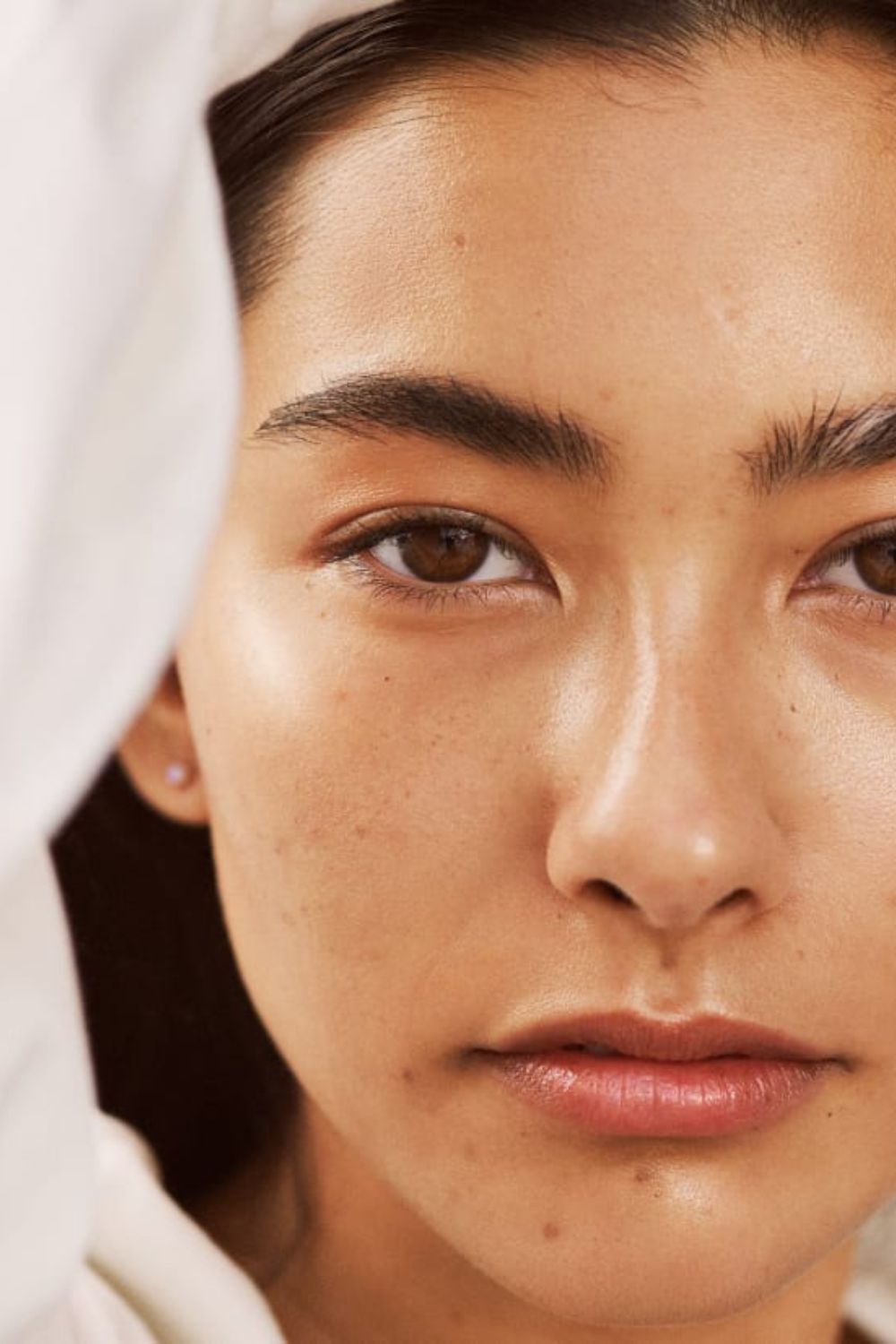Dare to go barely-there? These lightweight skin tints let freckles, beauty marks and natural texture shine. Photo / Pinterest