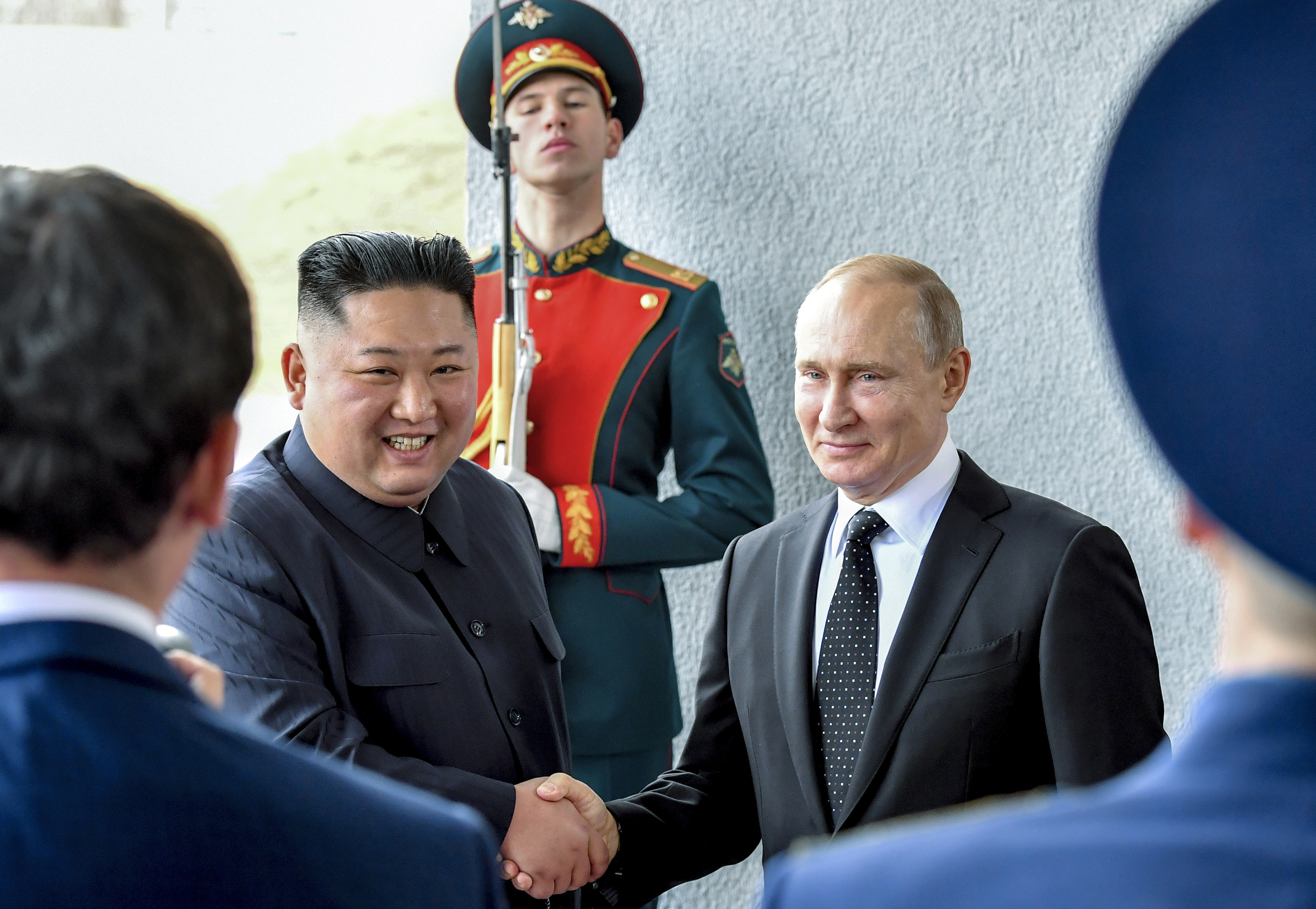 Russian President Vladimir Putin, centre right, and North Korea's leader Kim Jong Un shake hands during their meeting in Vladivostok, Russia. Photo / AP