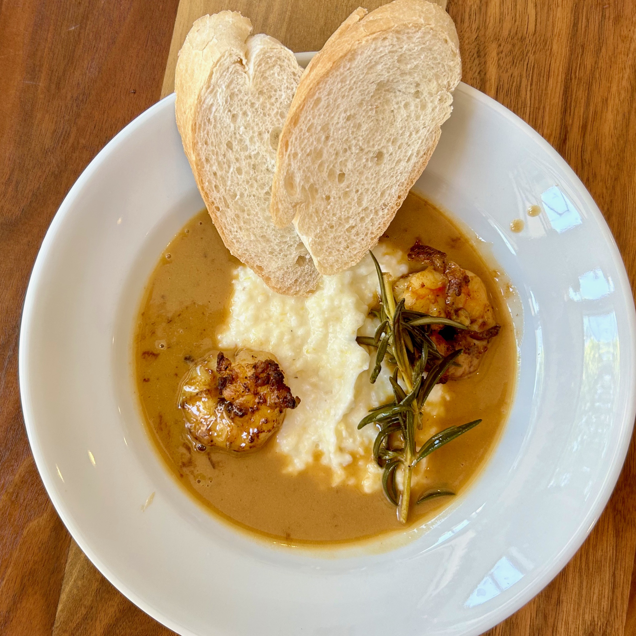 At the Mardi Gras School of Cooking, the class makes barbecue shrimp and grits. Photo / Yvette Cook