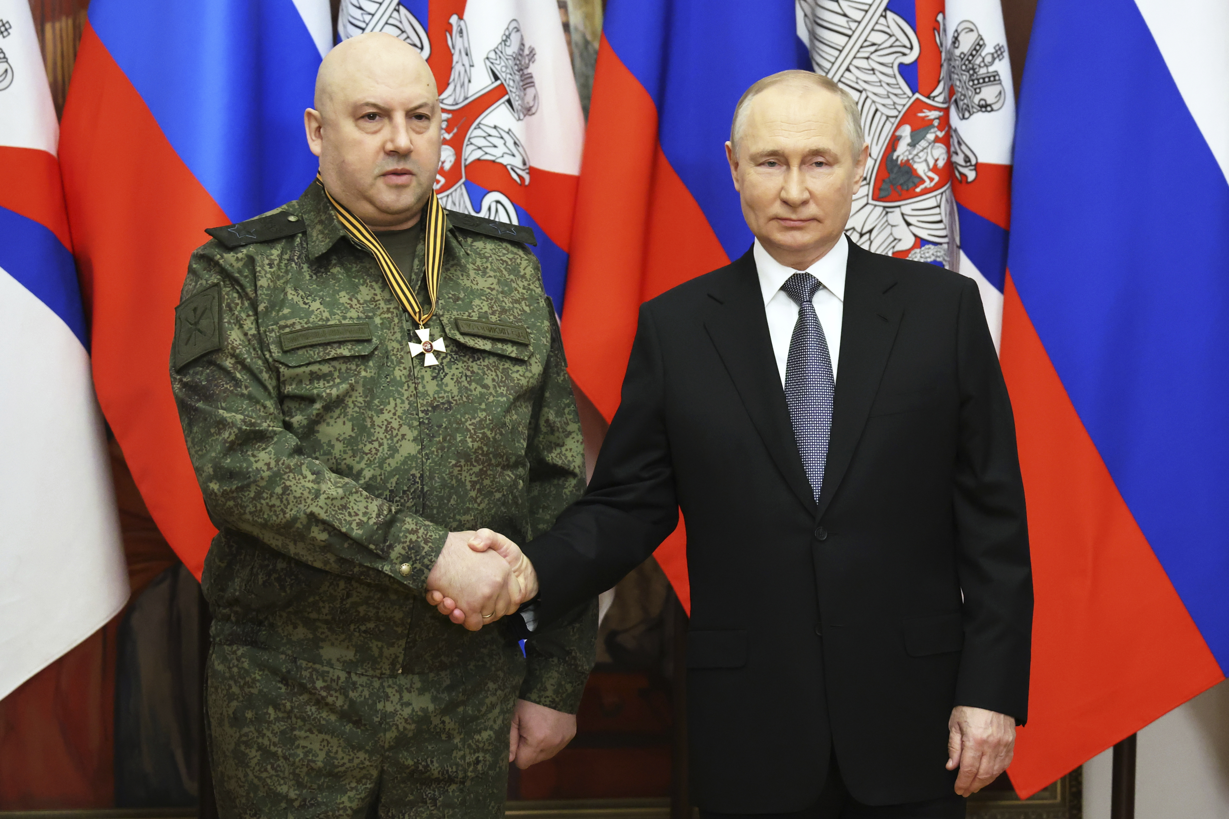 Russian President Vladimir Putin with the commander of Russia's military operation in Ukraine General Sergei Surovikin. Photo / AP