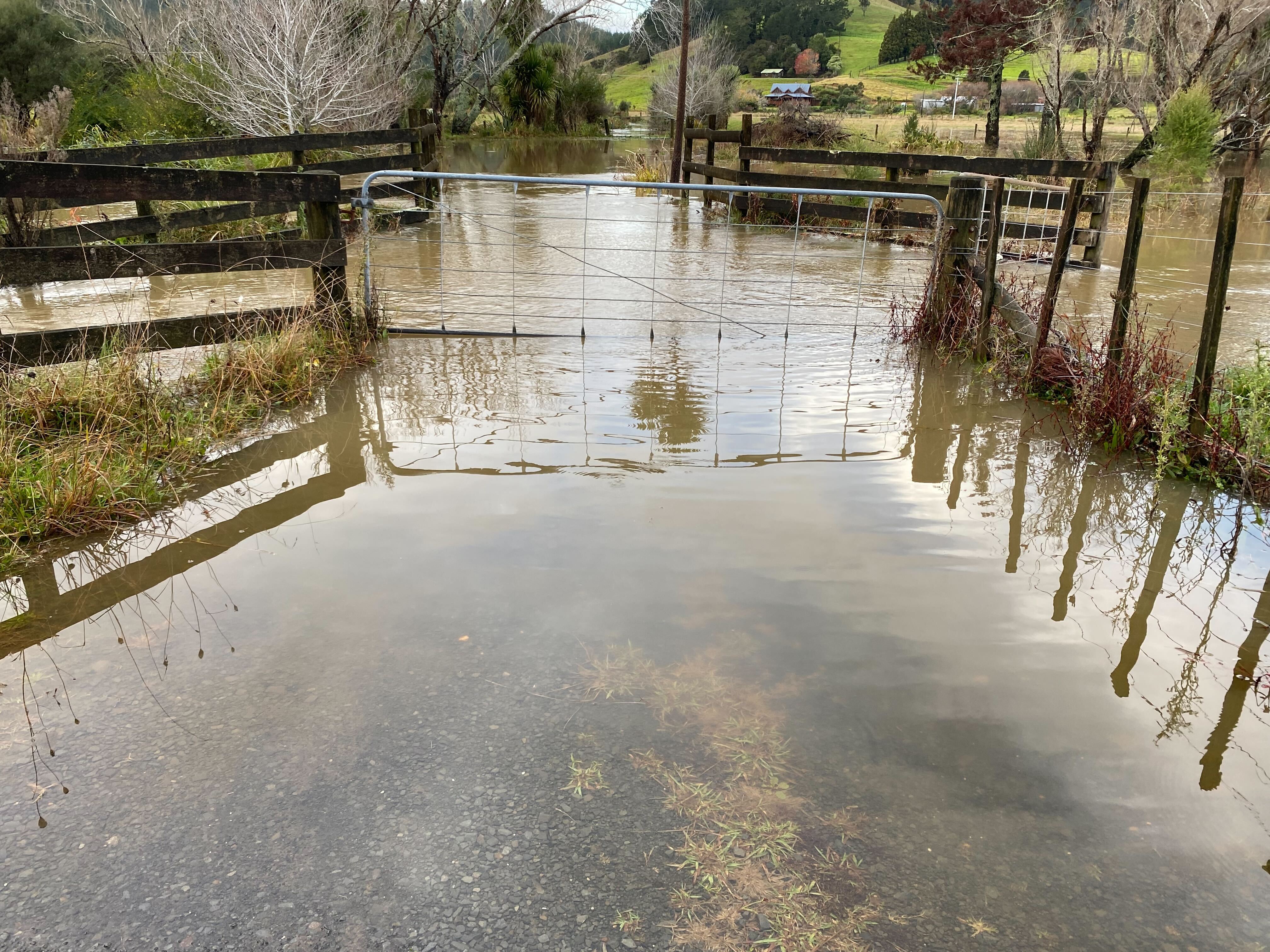 Flooding in Pāuanui. On Hikuai Settlement Rd near the intersection of SH25, much of the valley is swamped.