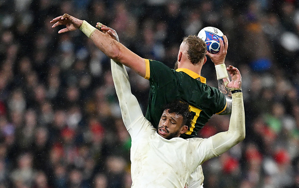 Pieter-Steph Du Toit of South Africa claims the ball against Courtney Lawes of England. Photo / Getty Images