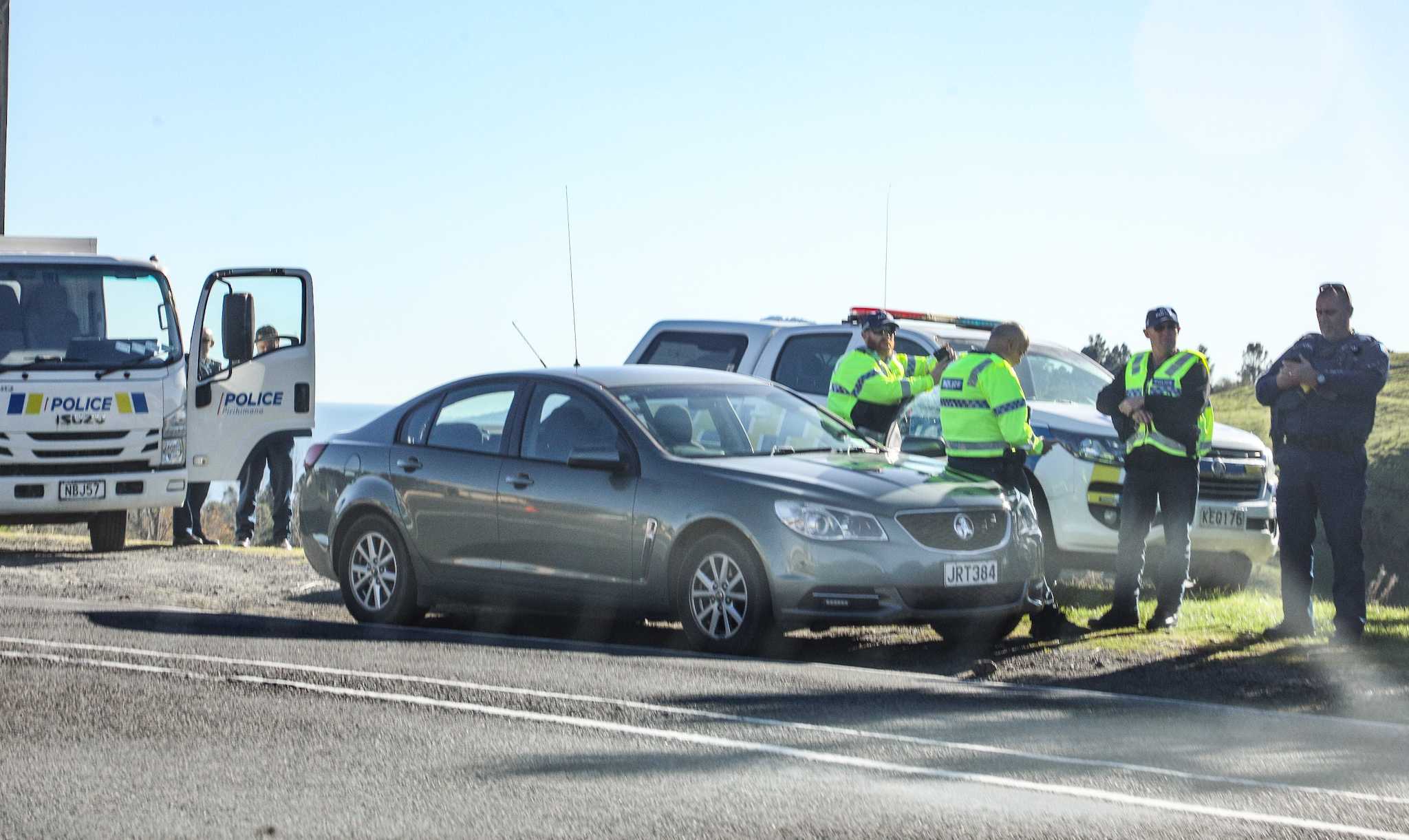 The police presence near the crematorium at Ōhope waiting for the funeral procession of Mongrel Mob Barbarian leader Steven Taiatini. Photo / Andrew Warner