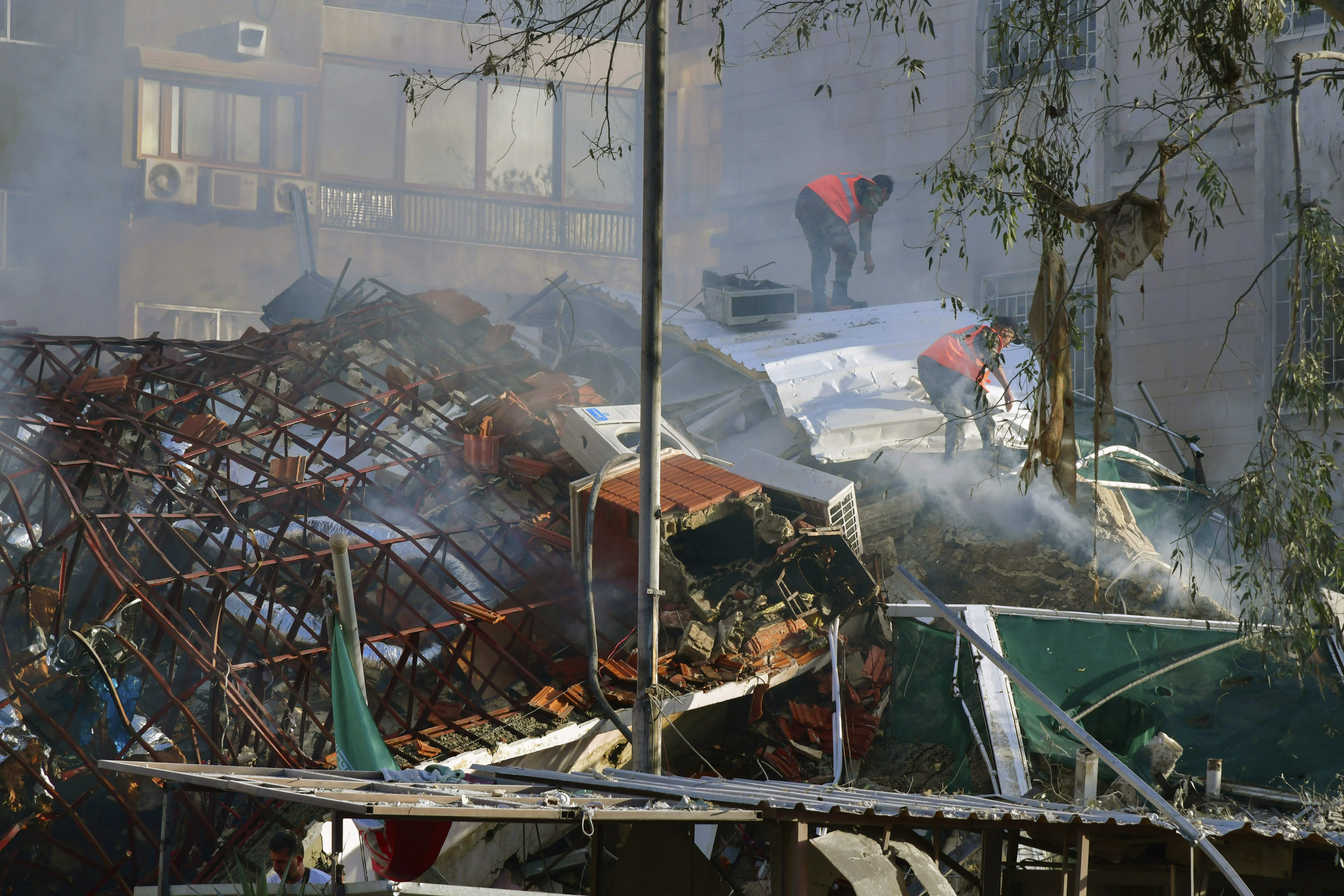 An Israeli airstrike has destroyed the consular section of Iran's embassy in Syria, killing a senior Iranian military adviser and roughly a handful of other people, Syrian state media said. Photo / AP