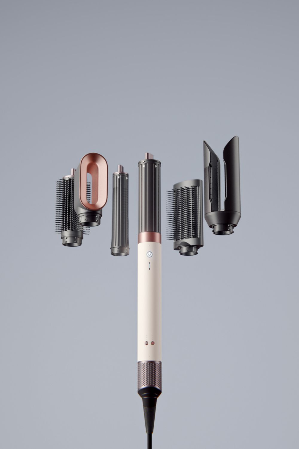 The multi-styler boasts six different attachments to create a variety of hair looks, from voluminous blowouts to smooth, straight styles. Photo / Supplied