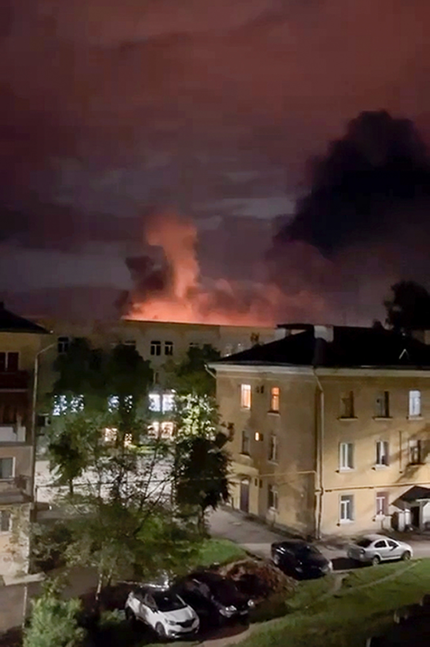 This photo taken from video provided by the official Telegram channel of Pskov region governor Mikhail Vedernikov, shows smoke billowing over the city and a large blaze in Pskov, Russia. Photo / AP