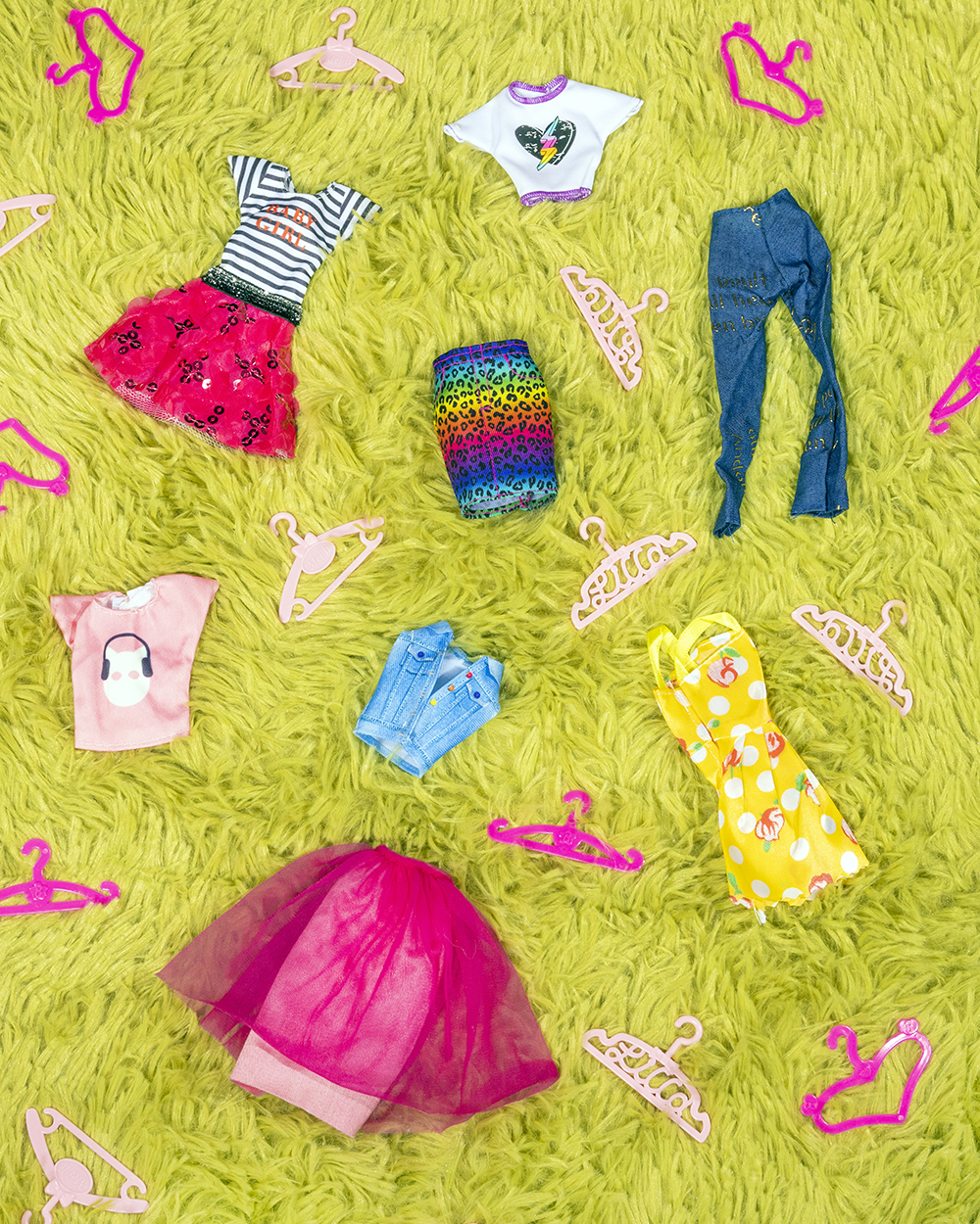 Barbie made her entrance into the world in a knit, black-and-white-striped, strapless one-piece swimsuit, but even back then she had other outfits — 22 of them, in fact. Photo / Elizabeth Renstrom, The New York Times