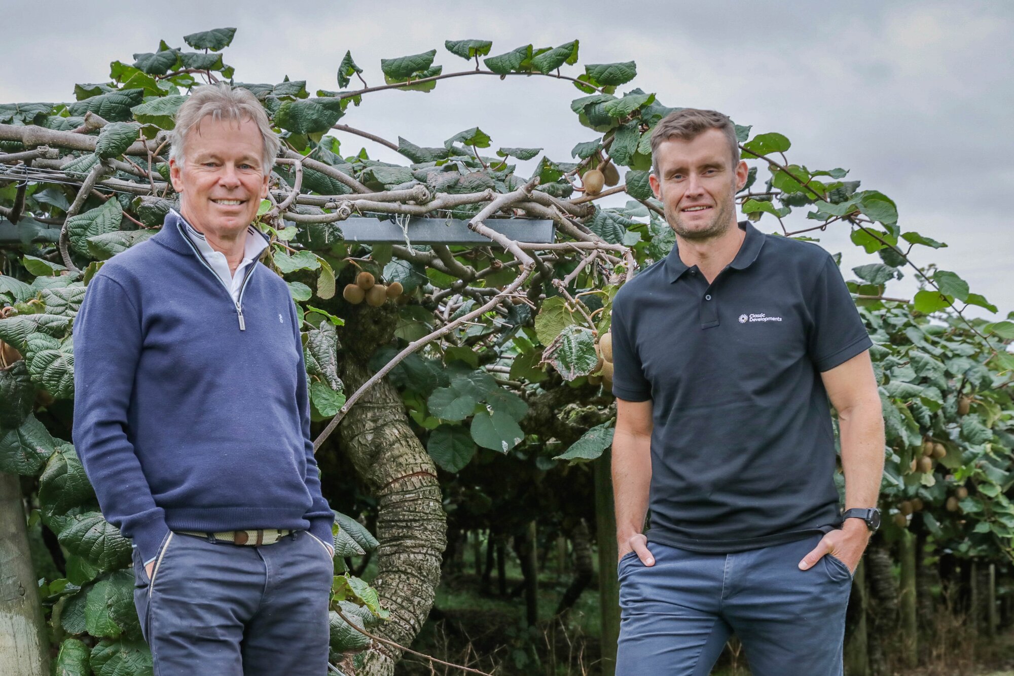 Classic Group is planning to build a 75-lot subdivision on a kiwifruit orchard on Inverness Drive in Pyes Pa, Tauranga. Classic Group director Peter Cooney (left) and national development manager Andre de Jong. Photo / Kelly O'Hara