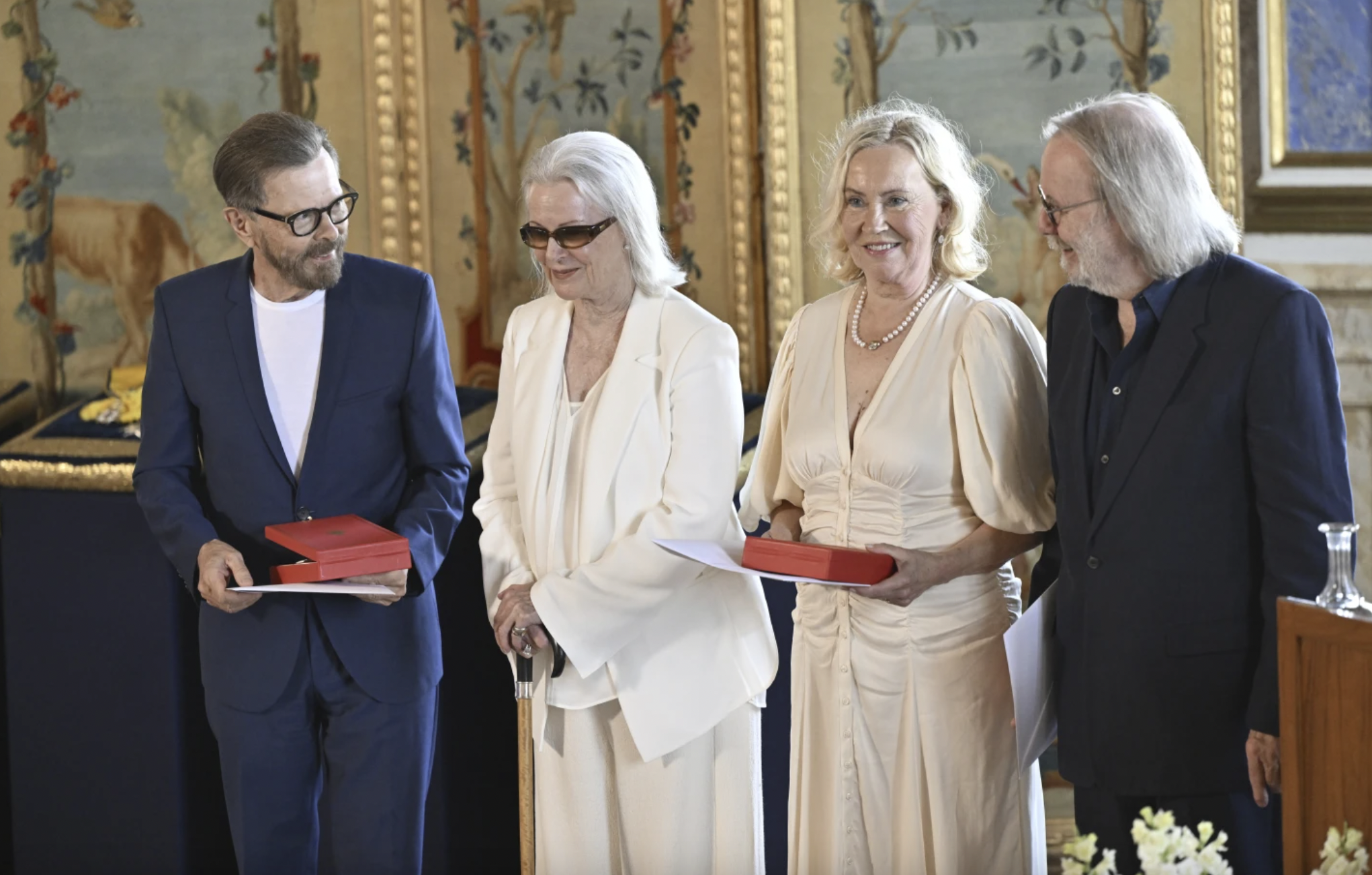The music group ABBA – Bjorn Ulvaeus (left), Anni-Frid Lyngstad, Agnetha Faltskog and Benny Andersson – receive the Royal Vasa Order during a ceremony at Stockholm Royal Palace. Photo / AP