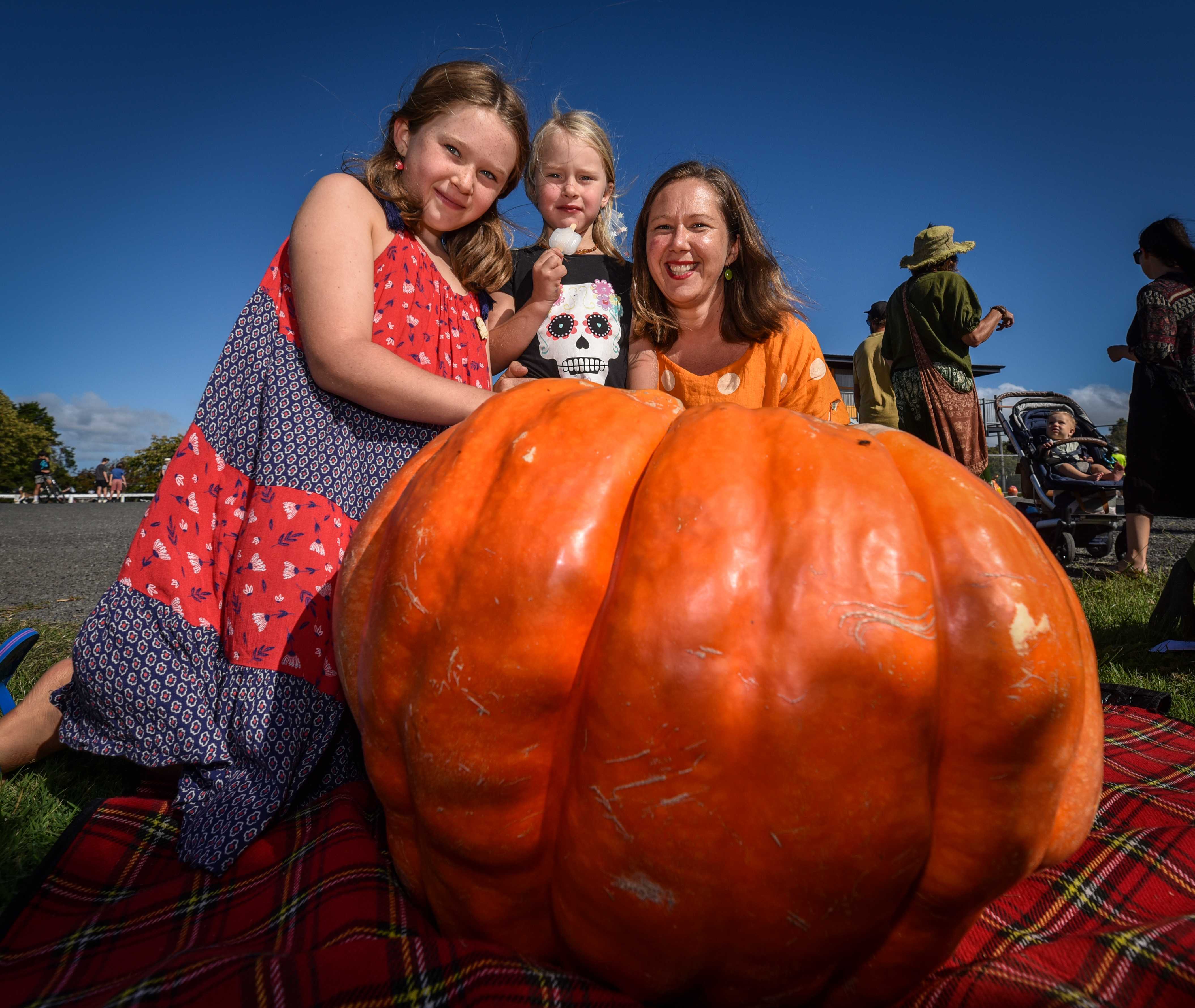 Lucia Menzies, Mathilde Menzies and Caroline Clark, of Argyll, with the heaviest pumpkin, the 98.4kg
