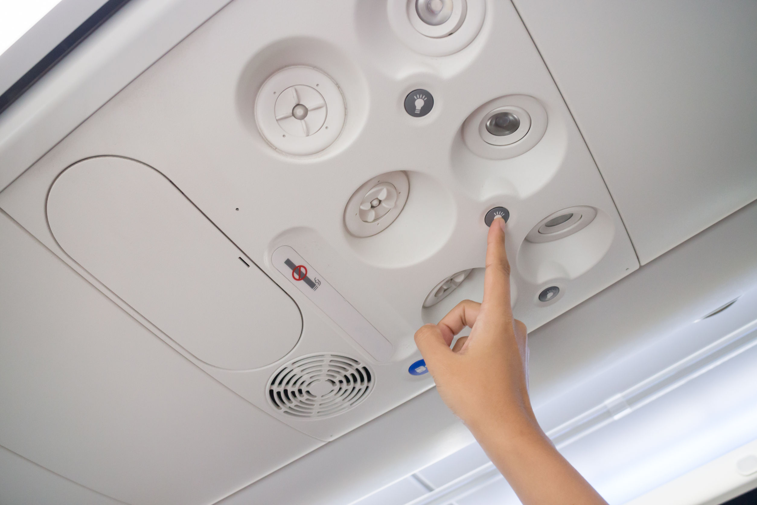 Flight Attendant Call Button: When Should You Use It? - One Mile