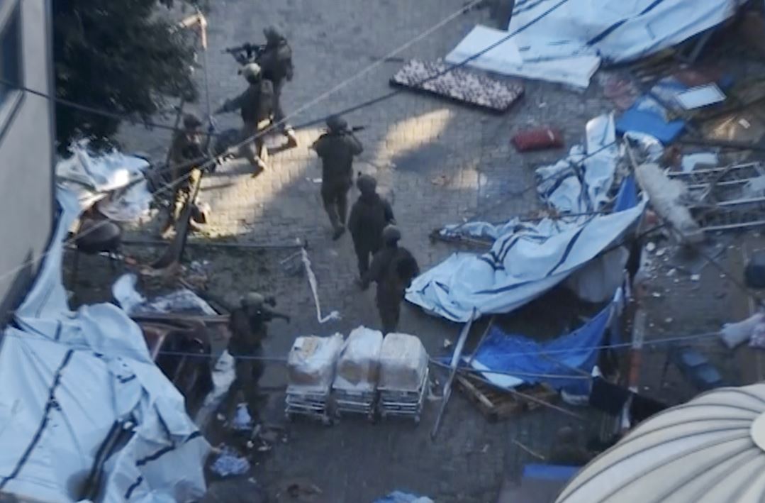 Israeli soldiers walk in the area of Al-Shifa Hospital in Gaza City. Photo / AP