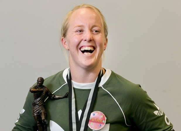Kendra Cocksedge shows off her armful of glittering prizes. Photo / Alan Gibson