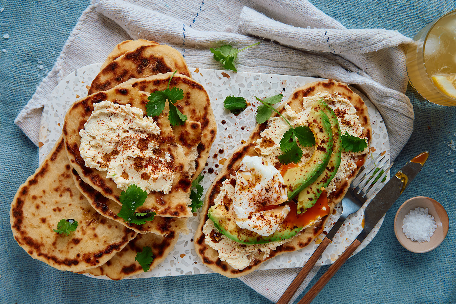 Fluffy flatbreads are the perfect vehicle for indulgent toppings — think bacon, eggs and mushrooms. Photo / Babiche Martens