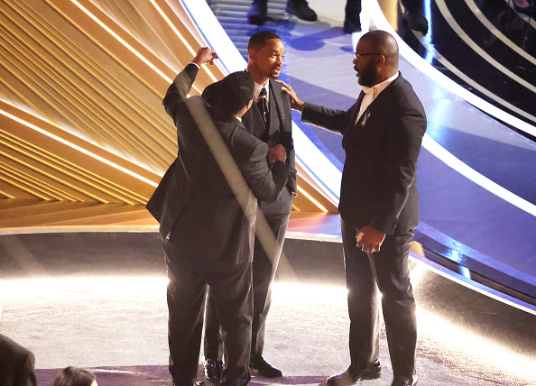 Denzel Washington, and Tyler Perry comfort Will Smith during the show at the Oscars. Photo / Getty Images