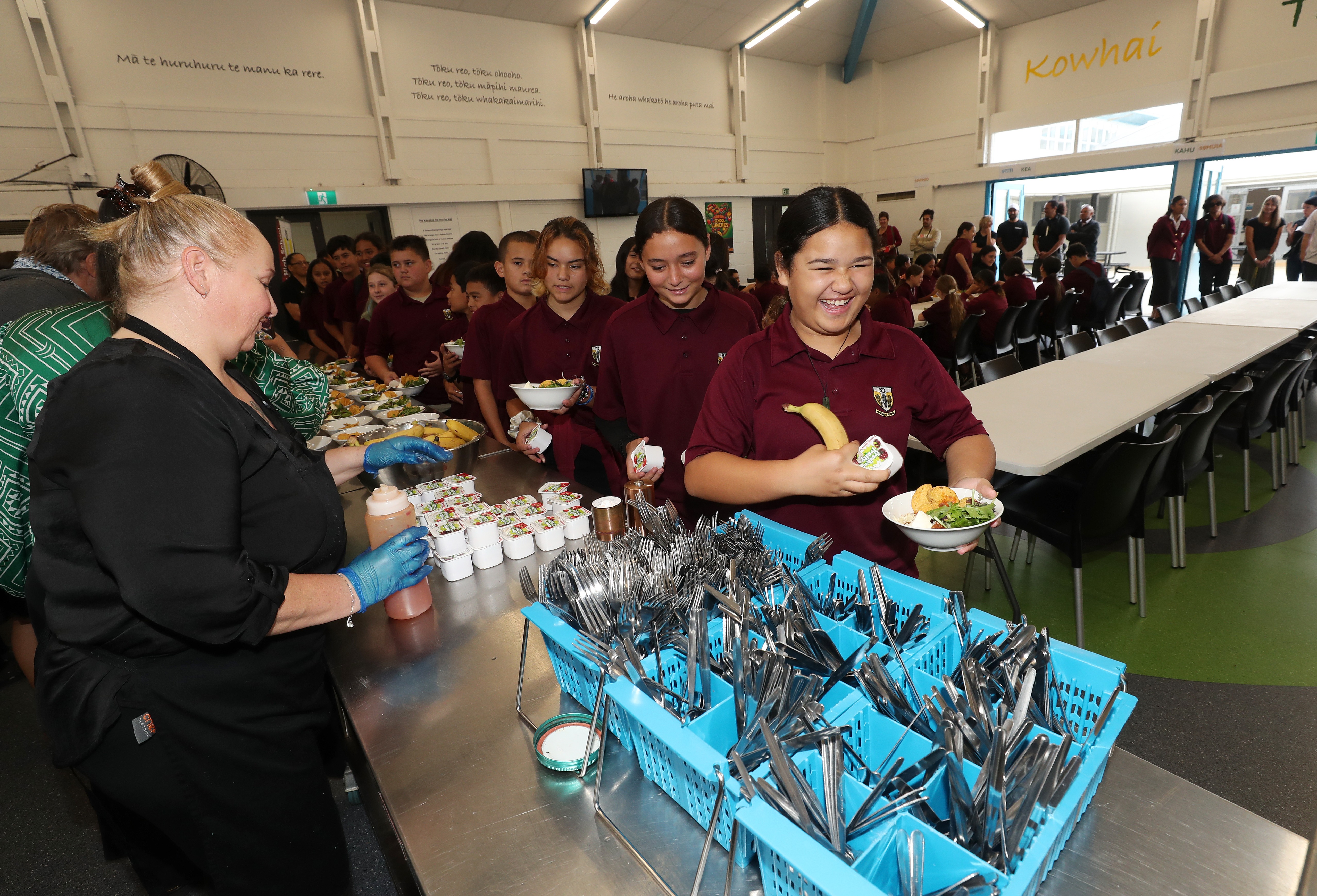 Tikipunga High School student Mj Keegan-Witehira, 11, is happy with her lunch of nachos, banana and yogurt. Photo /  Michael Cunningham