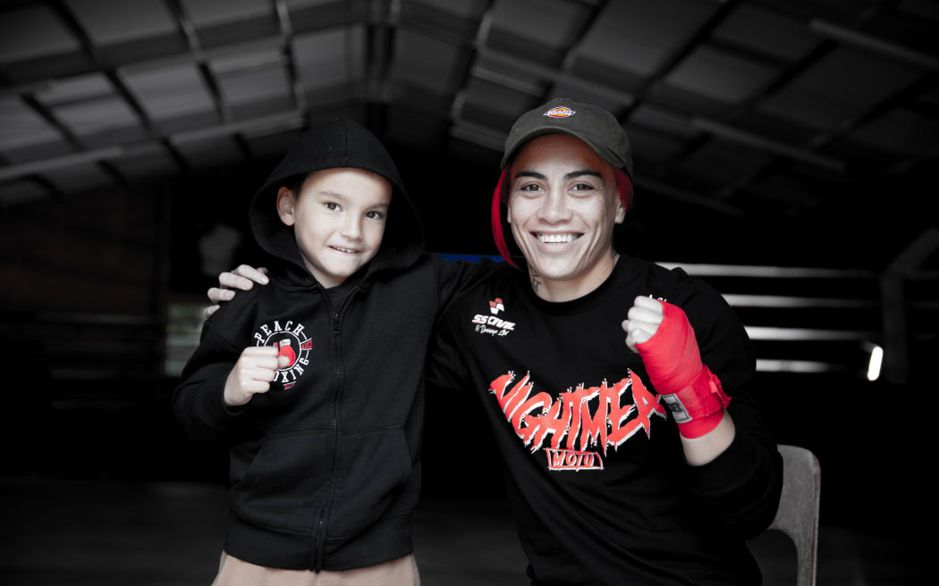 Mea Motu with her son. Photo/ RNZ - Marika Khabazi