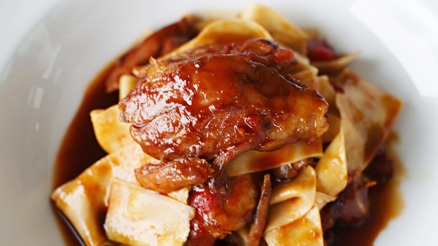 Slow-cooked lamb with tomato and pappardelle-image
