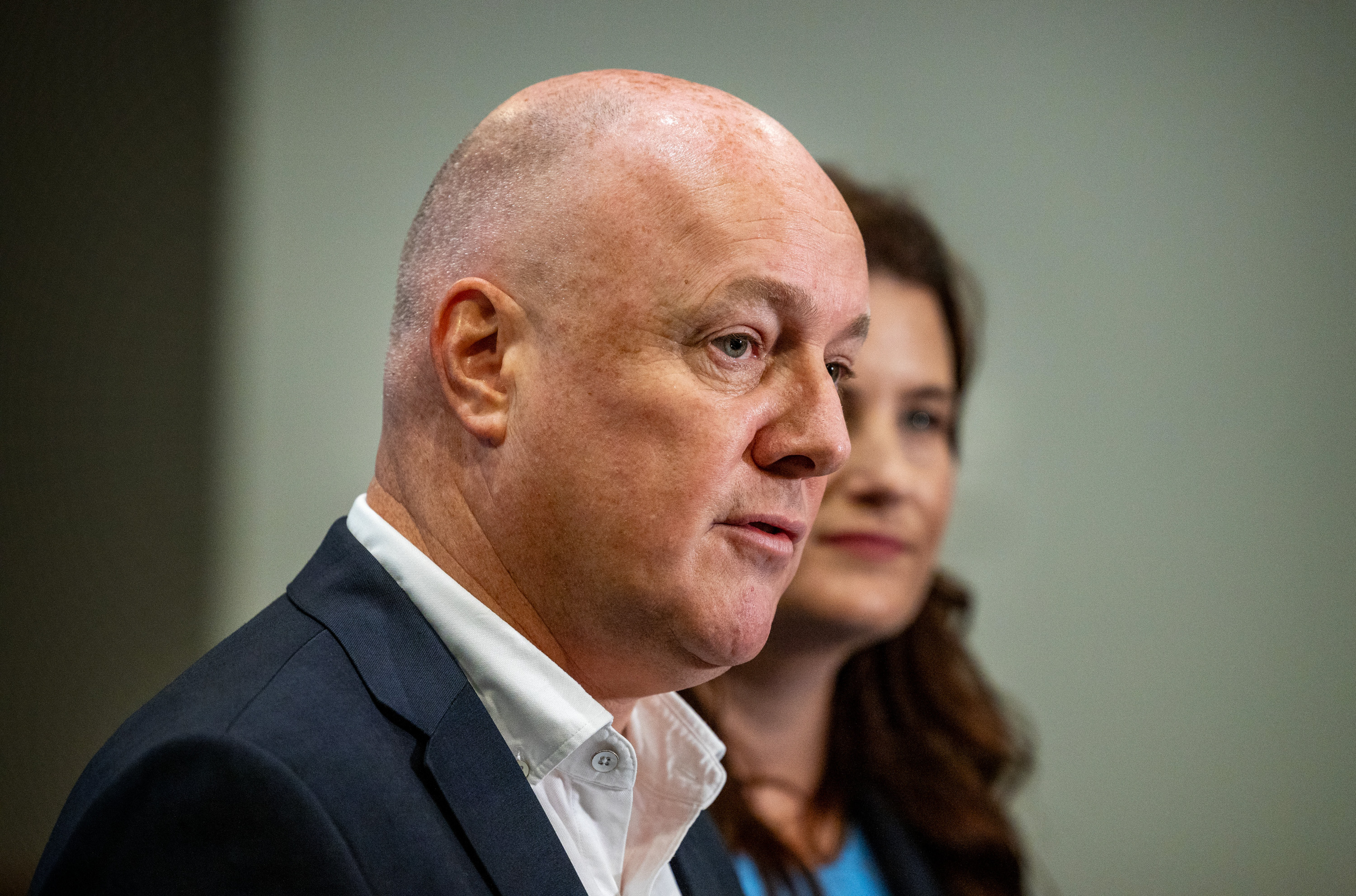 Prime Minister Christopher Luxon (left) and Finance Minister Nicola Willis talk to media at the National Party retreat in Hamilton. Photo / Mike Scott