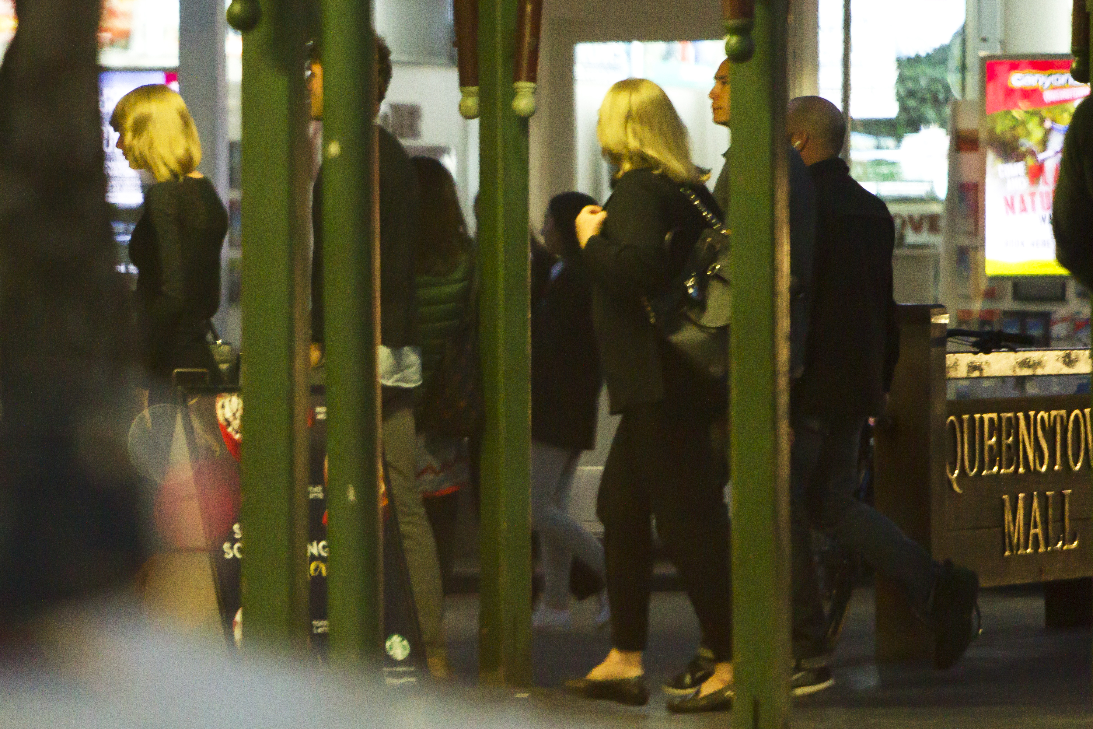 Taylor Swift and her mother, right, were accompanied by the singer's entourage for the private meal. Photo / James Allan