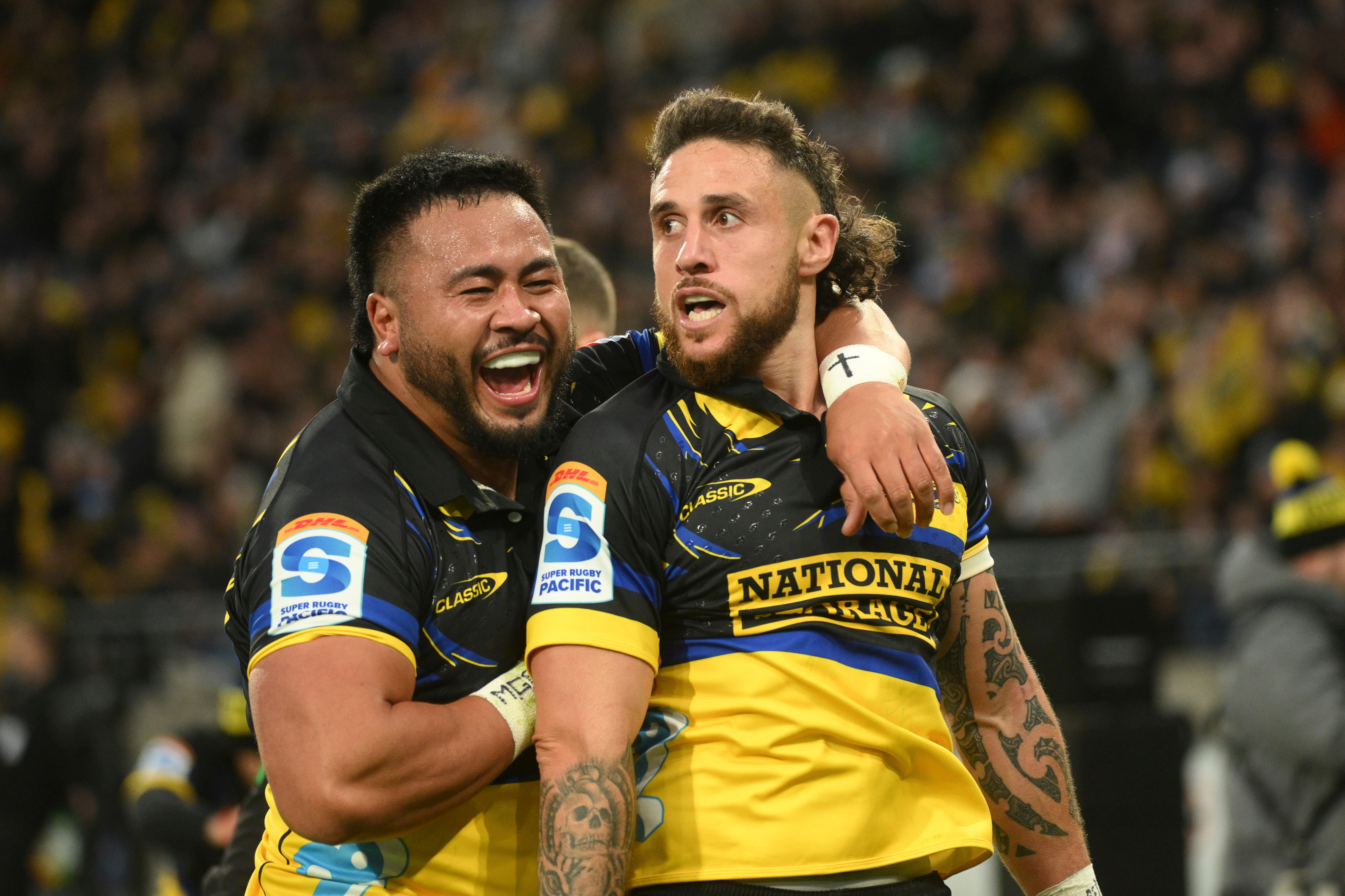 TJ Perenara (right) scored seven tries this season to become Super Rugby's all-time leading try-scorer with 63. Photo / Photosport