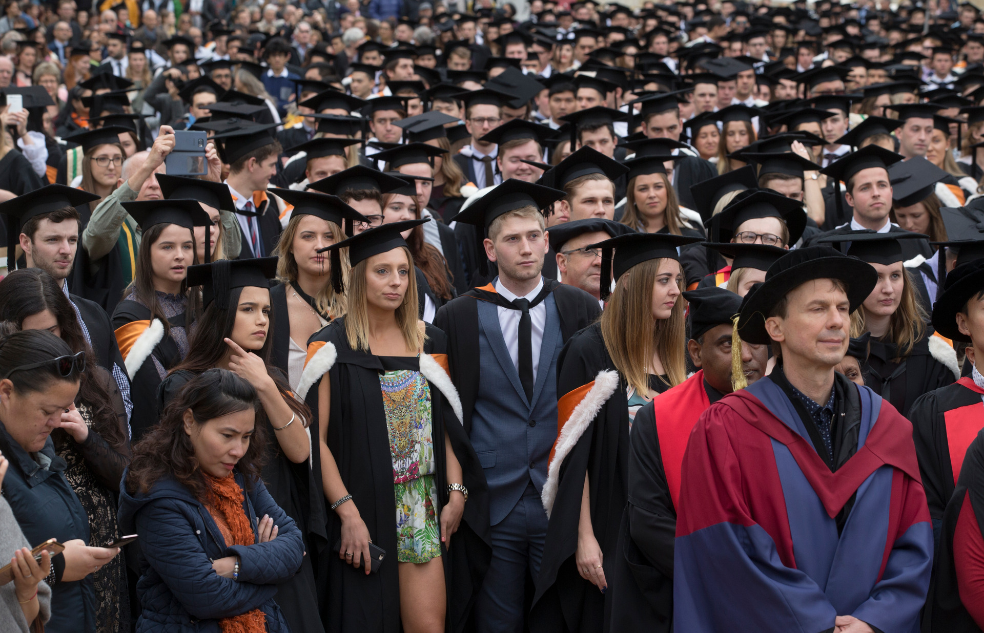 National has accused Government of shifting the goalposts on its fees-free policy. Above, Victoria University students at graduation in 2017. Photo / File