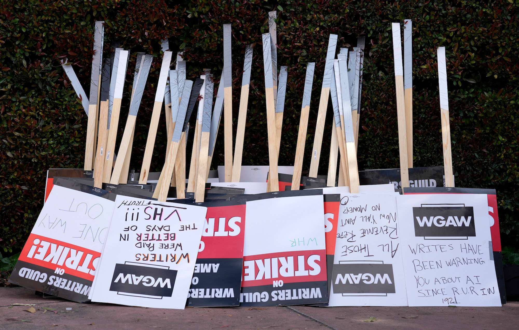 Placards are gathered together at the close of a picket by members of The Writers' Guild of America outside Walt Disney Studios. Photo / AP