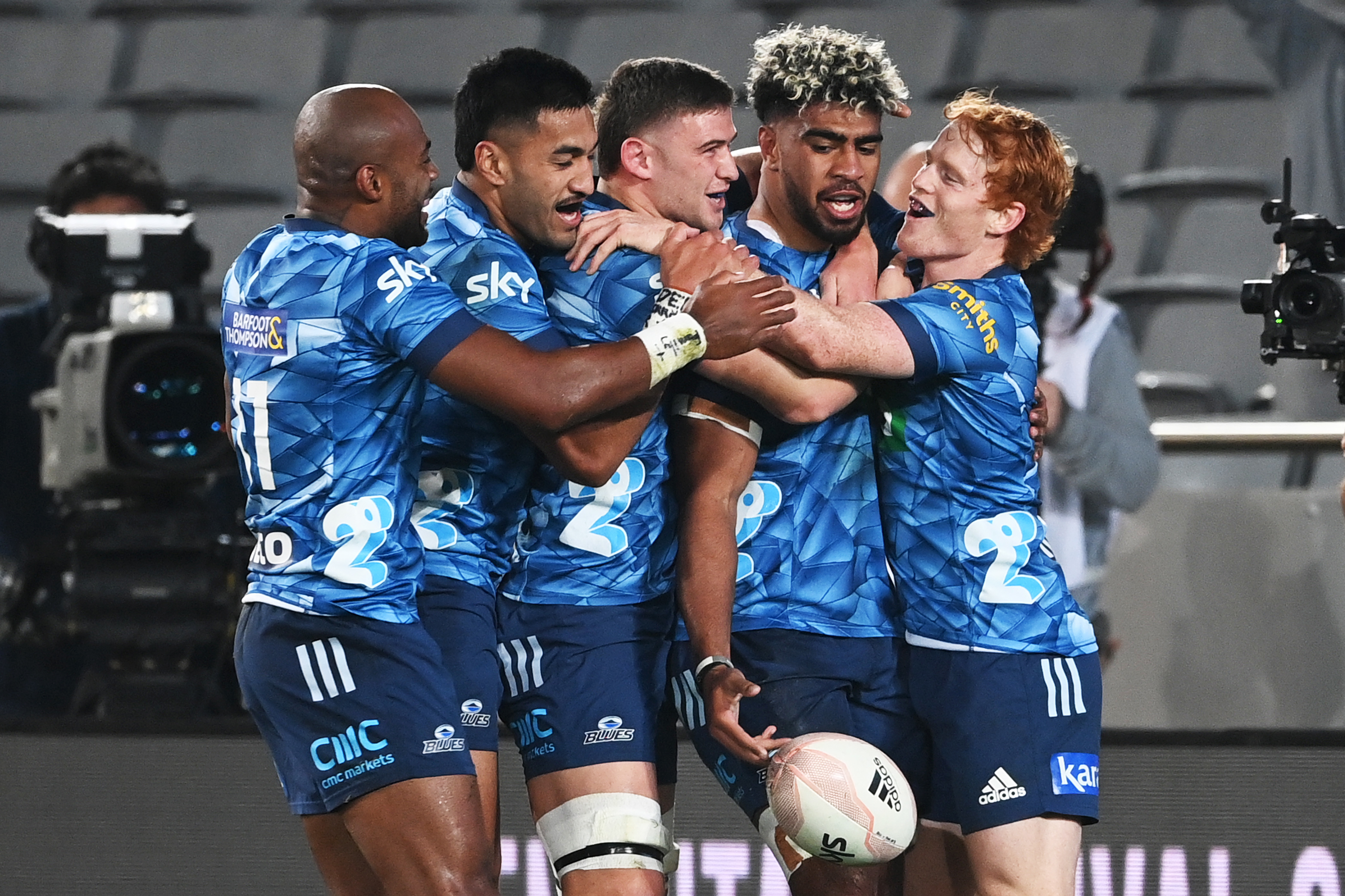(Left to right): Mark Telea, Rieko Ioane, Dalton Papali'i, Hoskins Sotutu (try-scorer) and Finlay Christie celebrate following the Blues vs Force match of the Sky Super Rugby Trans-Tasman competition at Eden Park, Auckland, New Zealand on Saturday, June 12, 2021. Photo / www.photosport.nz