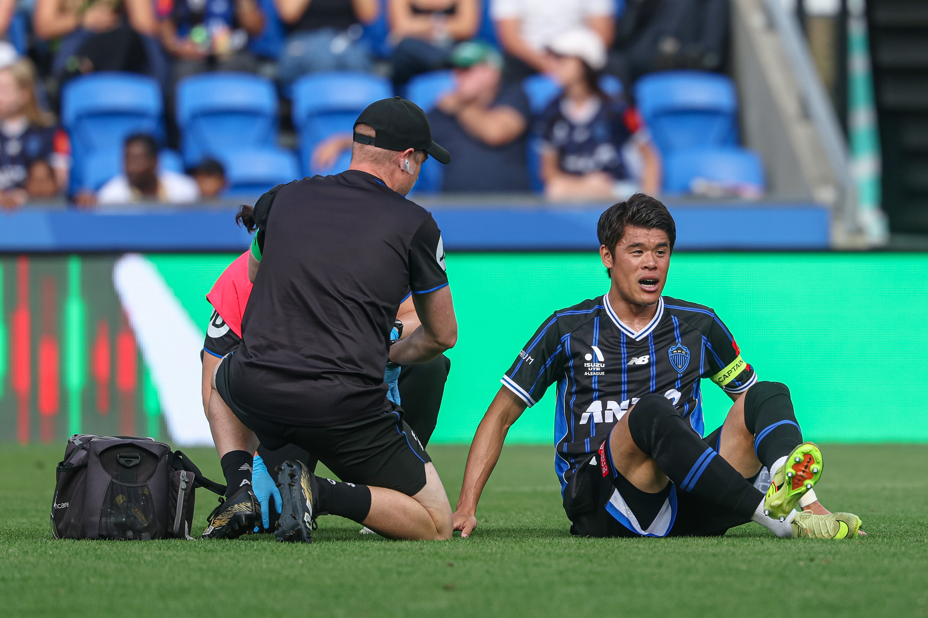 Hiroki Sakai leaves the field injured. Photo / Photosport
