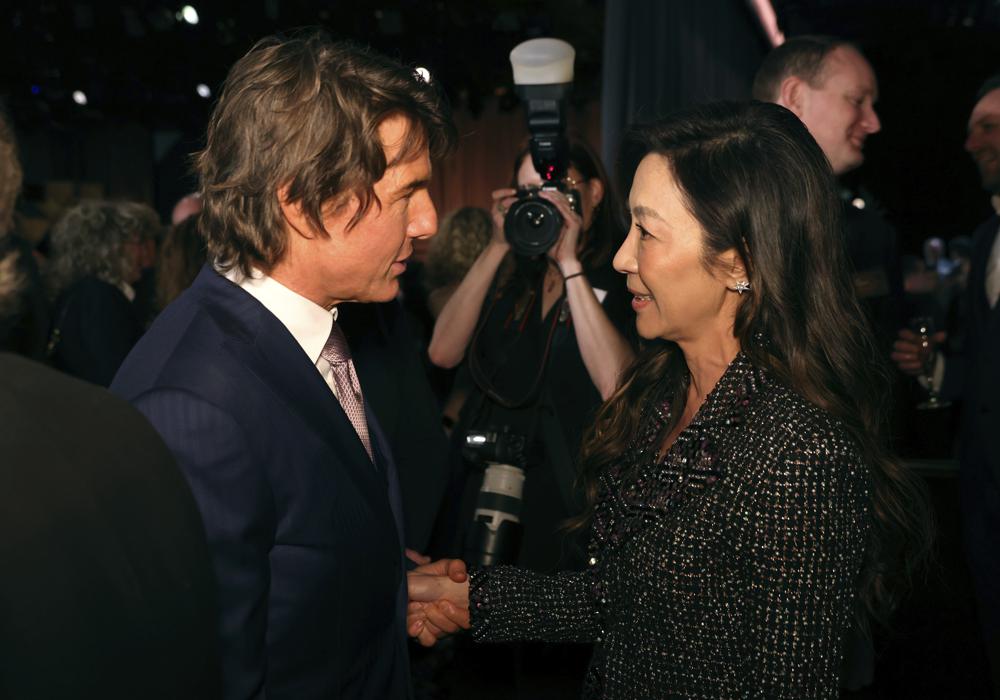 Tom Cruise, left, and Michelle Yeoh attend the 95th Academy Awards Nominees Luncheon on Monday, Feb. 13, 2023. Photo / AP