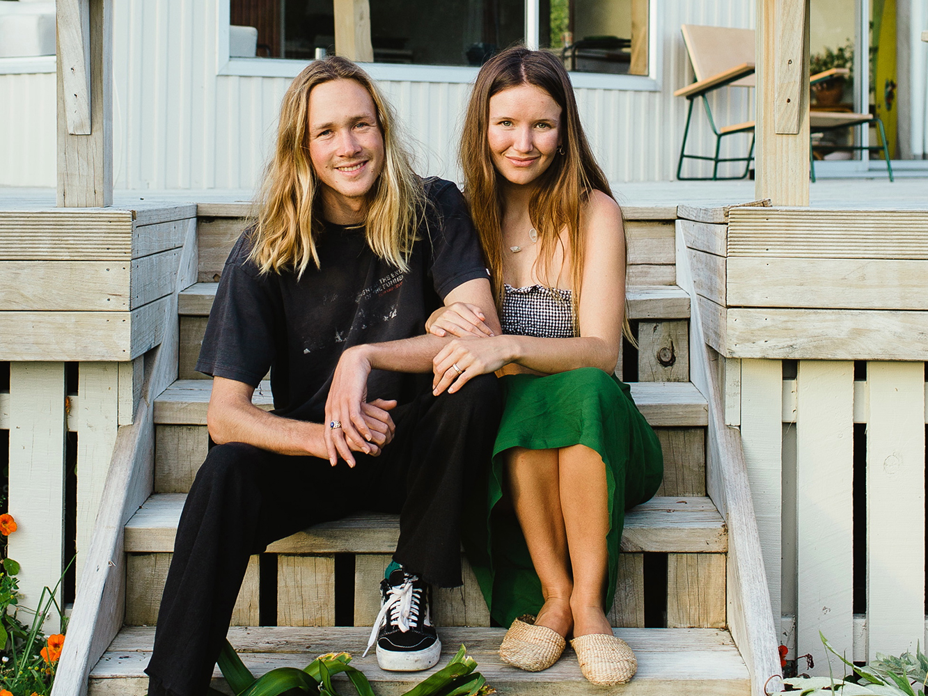 Artists Ophelia Mikkelson and Ryder Jones at their bach-style home. Picture / Supplied