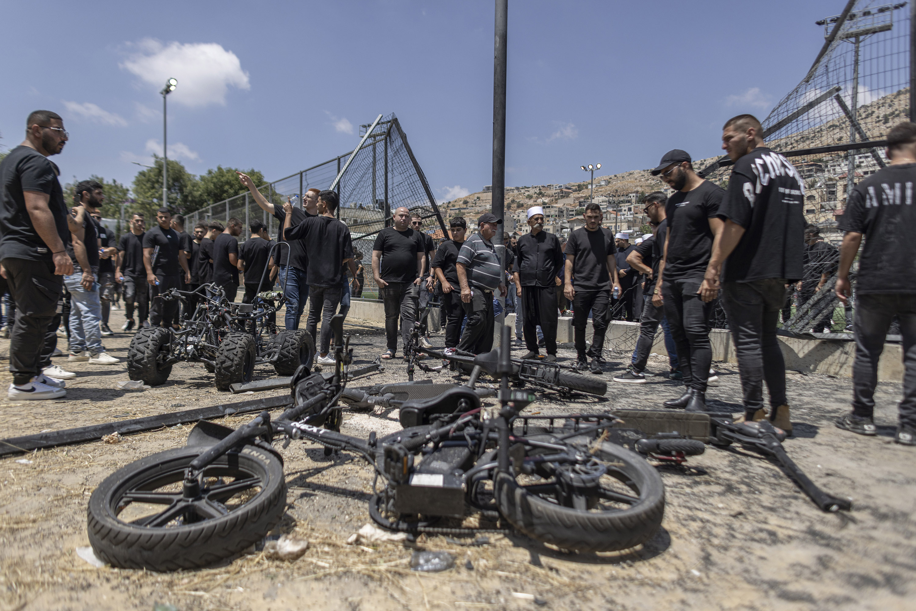 Burned motorbikes in July at a Golan Heights soccer field that was hit by a rocket fired from Lebanon. The attack, part of a back-and-forth over the border between Israel and Lebanon, killed 12 people. Photo / Avishag Shaar-Yashuv, The New York Times