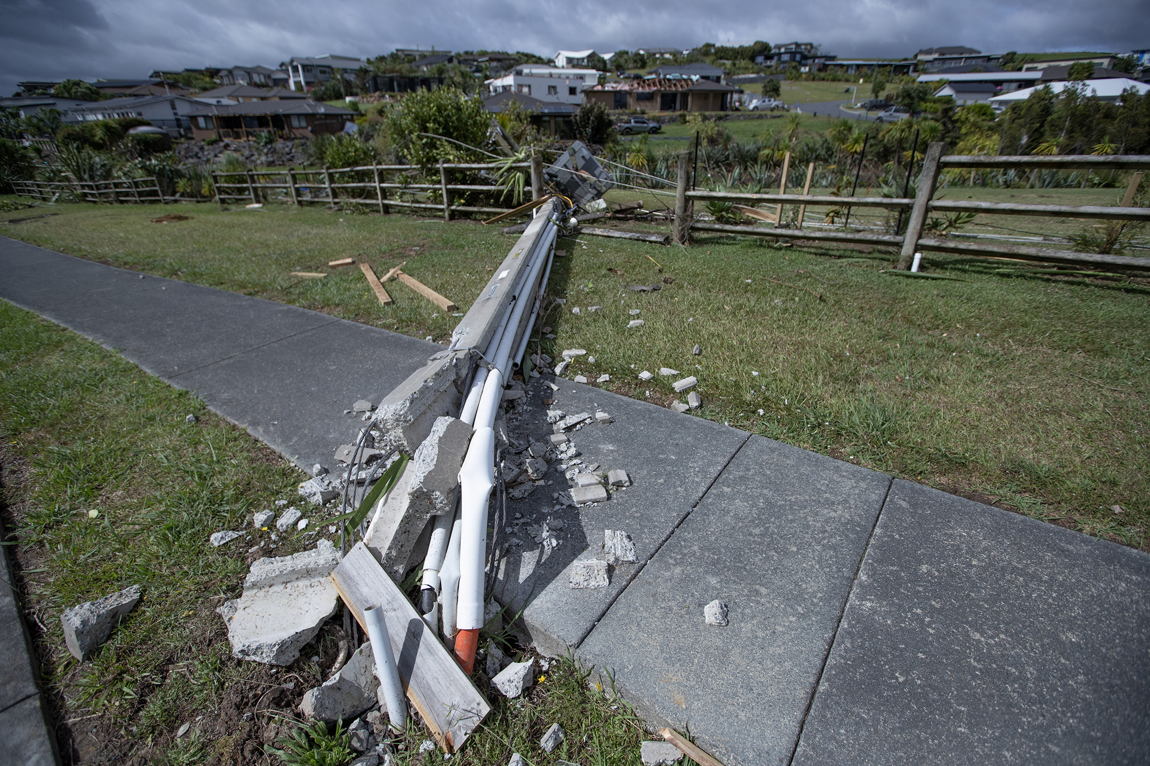 About 20 concrete power poles were smashed by the tornado. Photo / Hayden Woodward