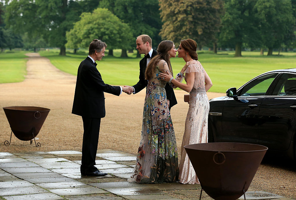 Prince William and the Duchess of Cambridge are greeted by David Cholmondeley and Rose Cholmondeley. Photo / Getty Images 