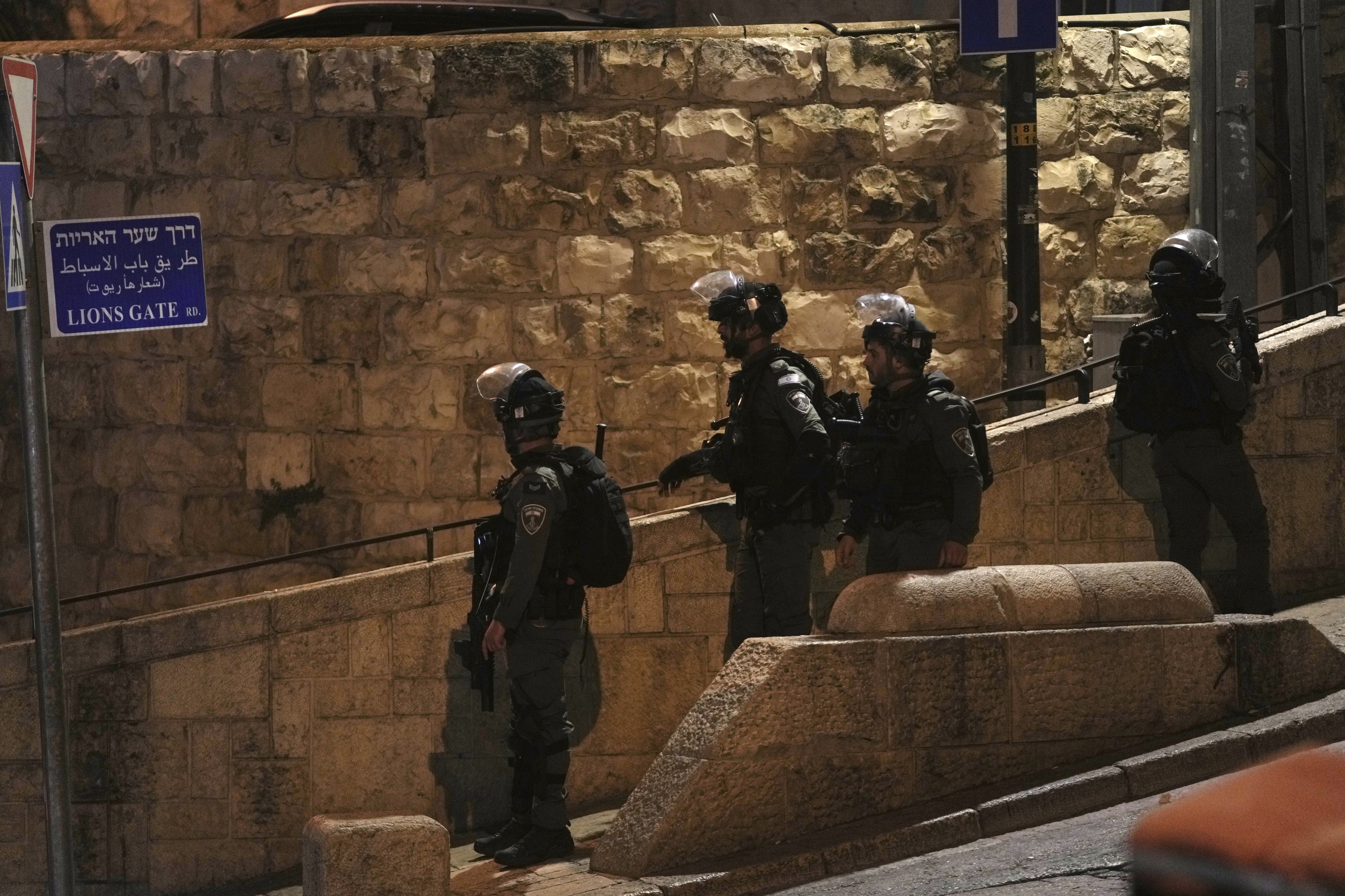 Israeli Border Police are deployed near the Lions' Gate to the Old City of Jerusalem during a raid by police at the Al-Aqsa Mosque compound. Photo / AP