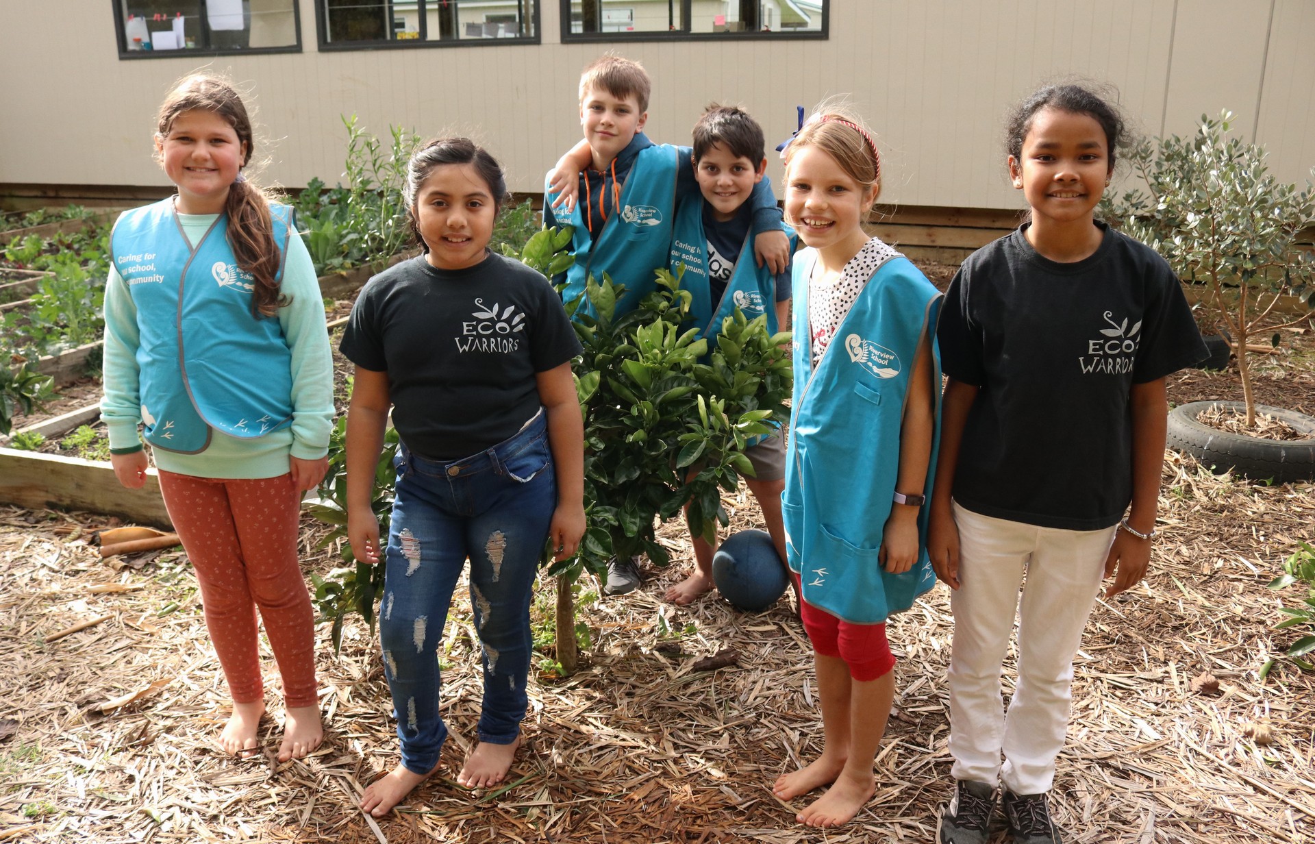 Riverview School Eco Warriors (from left) Sylva Morris, 10, Victoria Elu and Alexander Wall, both 9, Kavan Urlich, 11, and Bayley Wood and Konging Lim, both 10, in the school vegetable garden. Photo / Peter de Graaf 