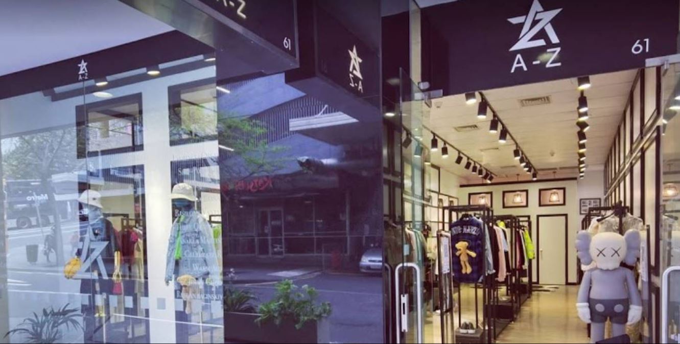 The new case in Auckland is a woman in her 20s who works at A-Z Collections in Auckland's High St.
