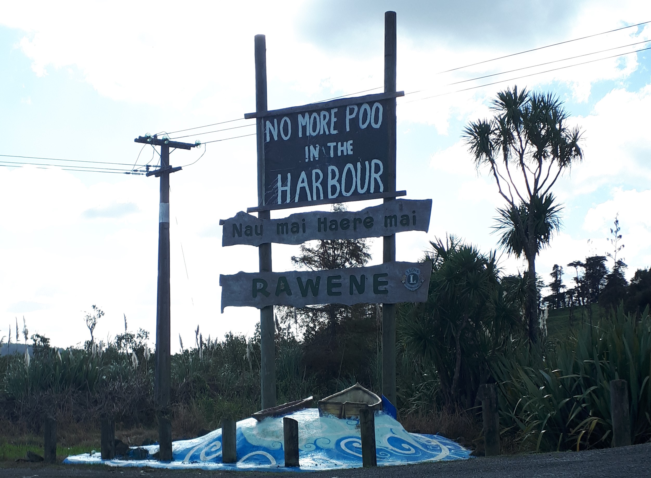 Protest signs sprouted across Rāwene this week opposing the Far North District Council's plans to continue discharging wastewater into the Hokianga Harbour.