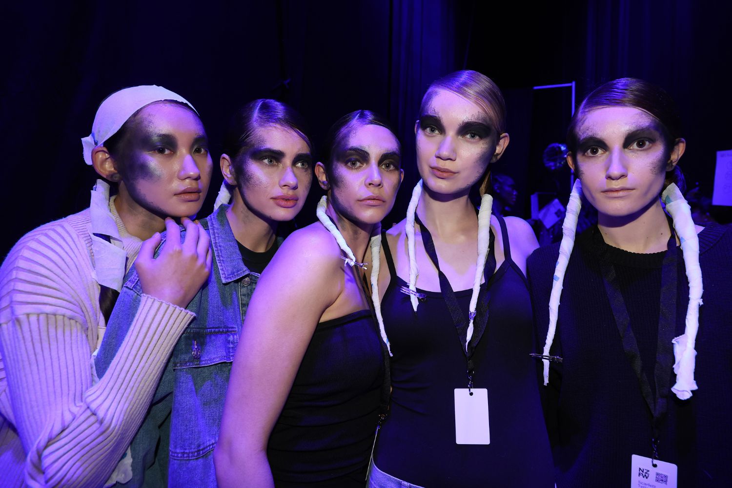 Final call: Five models wait for final amends to their hair at Lontessa before dressing. Photo / Getty Images