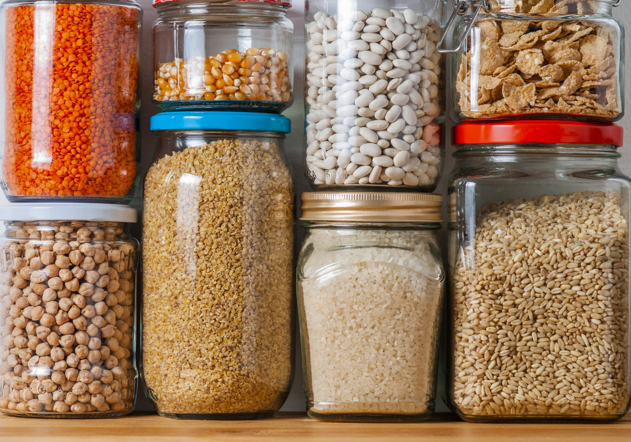Rice and legumes have a long shelf life and can be bought in bulk. Photo / Getty Images