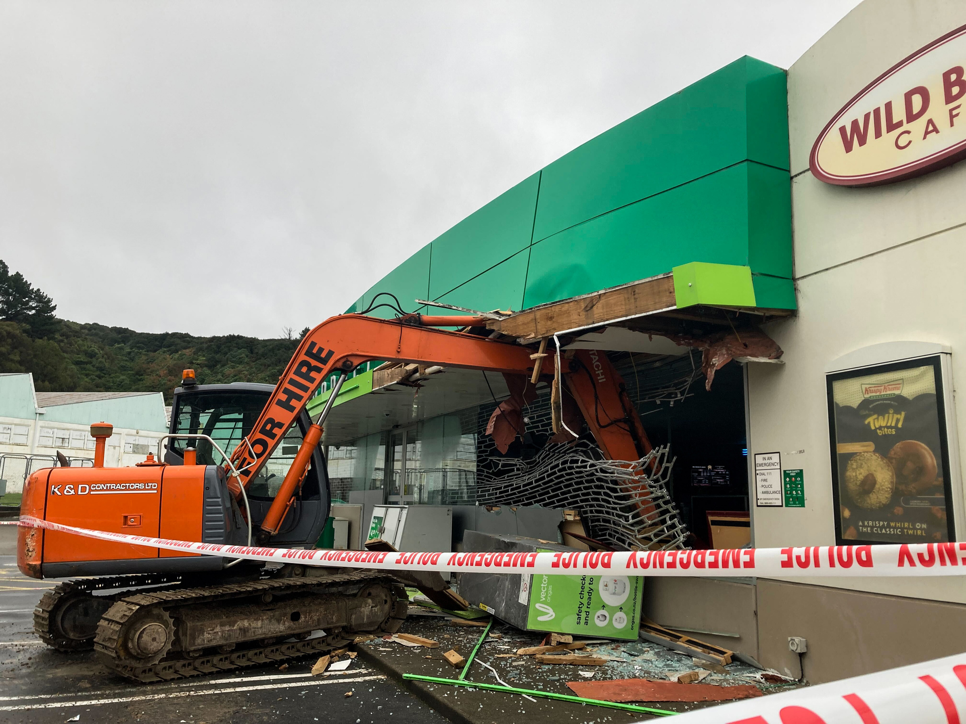 A stolen excavator used in a ram-raid burglary of the BP Connect service station in Wainuiomata. Photo / Melissa Nightingale